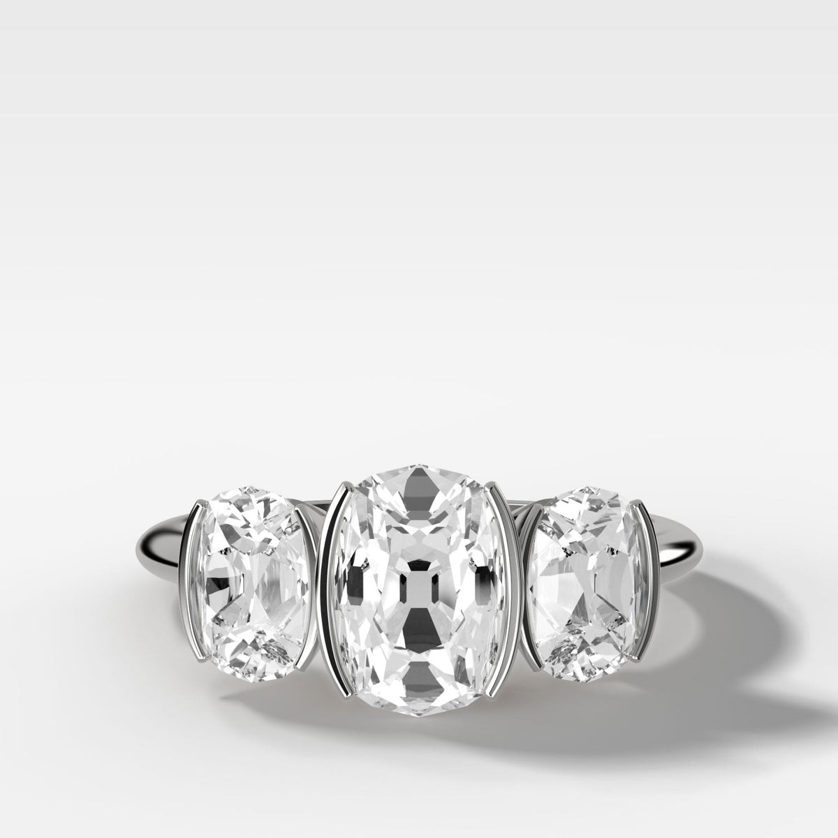 Half Bezel Triad Engagement Ring With Elongated Old Mine Cut Diamonds - GOODSTONE