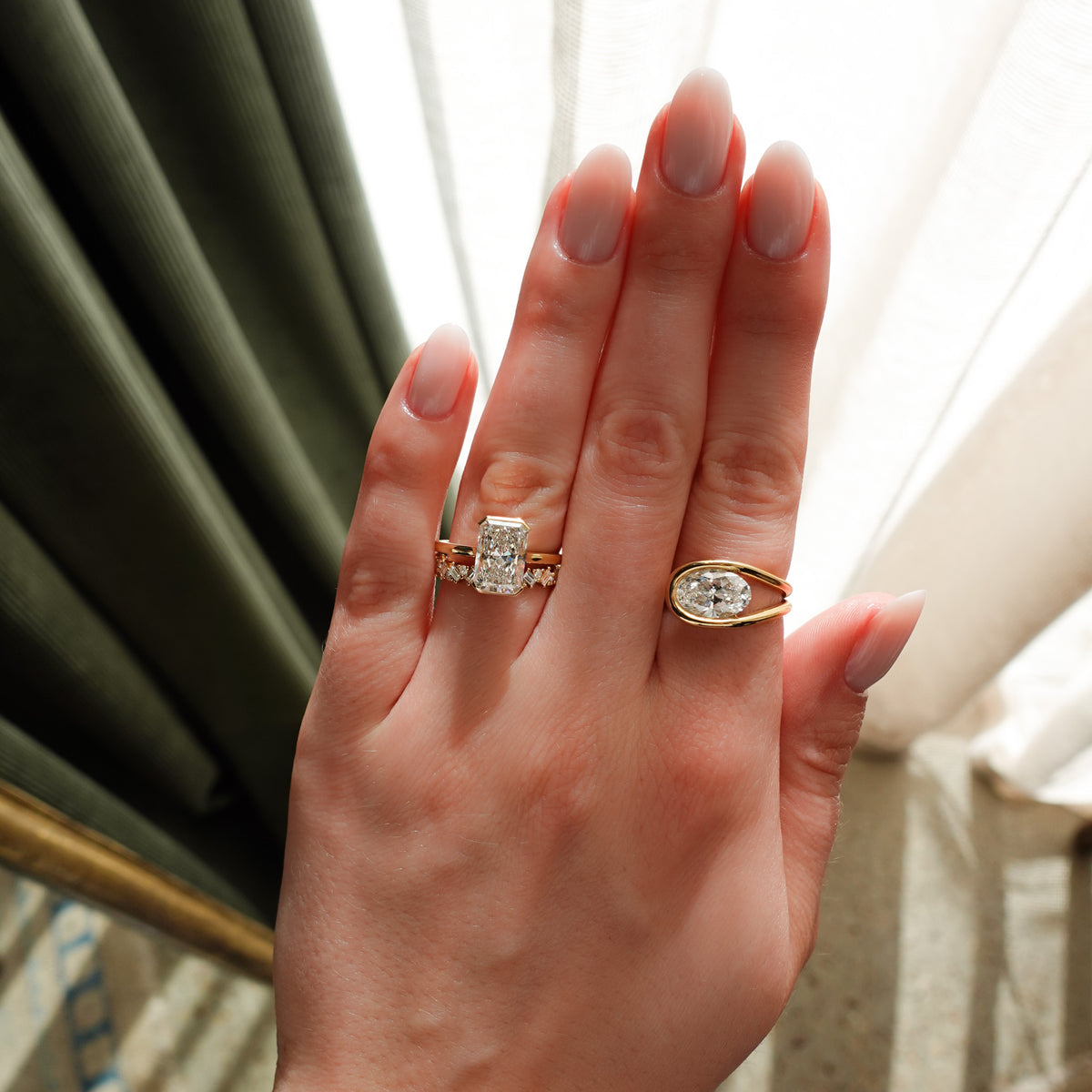 North South Half Bezel Solitaire Engagement Ring With Elongated Radiant Cut Diamond