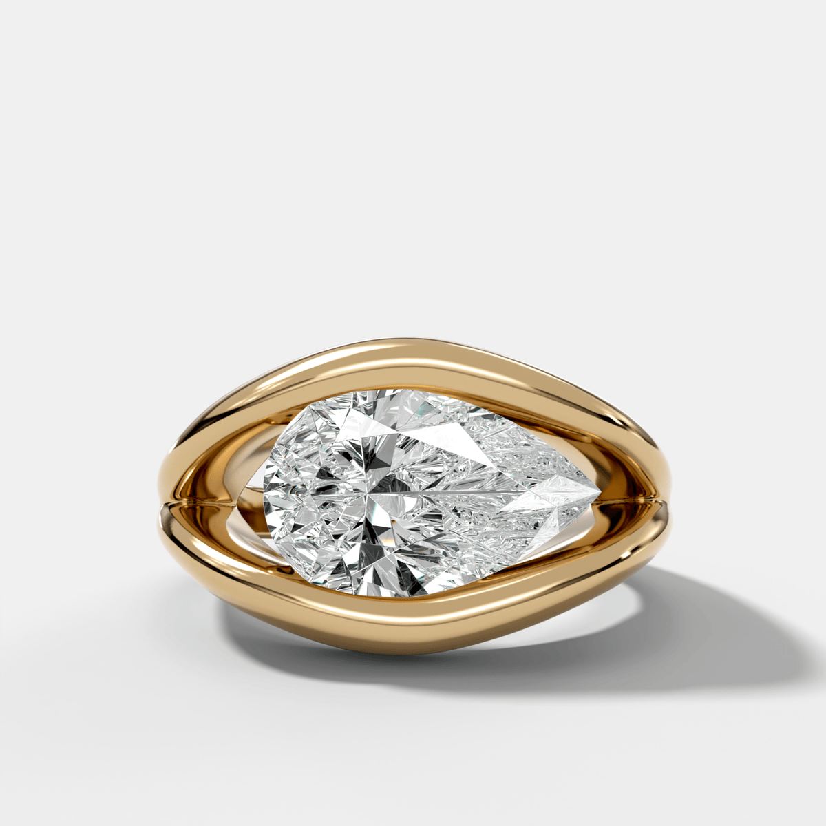 Iris Engagement Ring With a Pear Cut Diamond - GOODSTONE