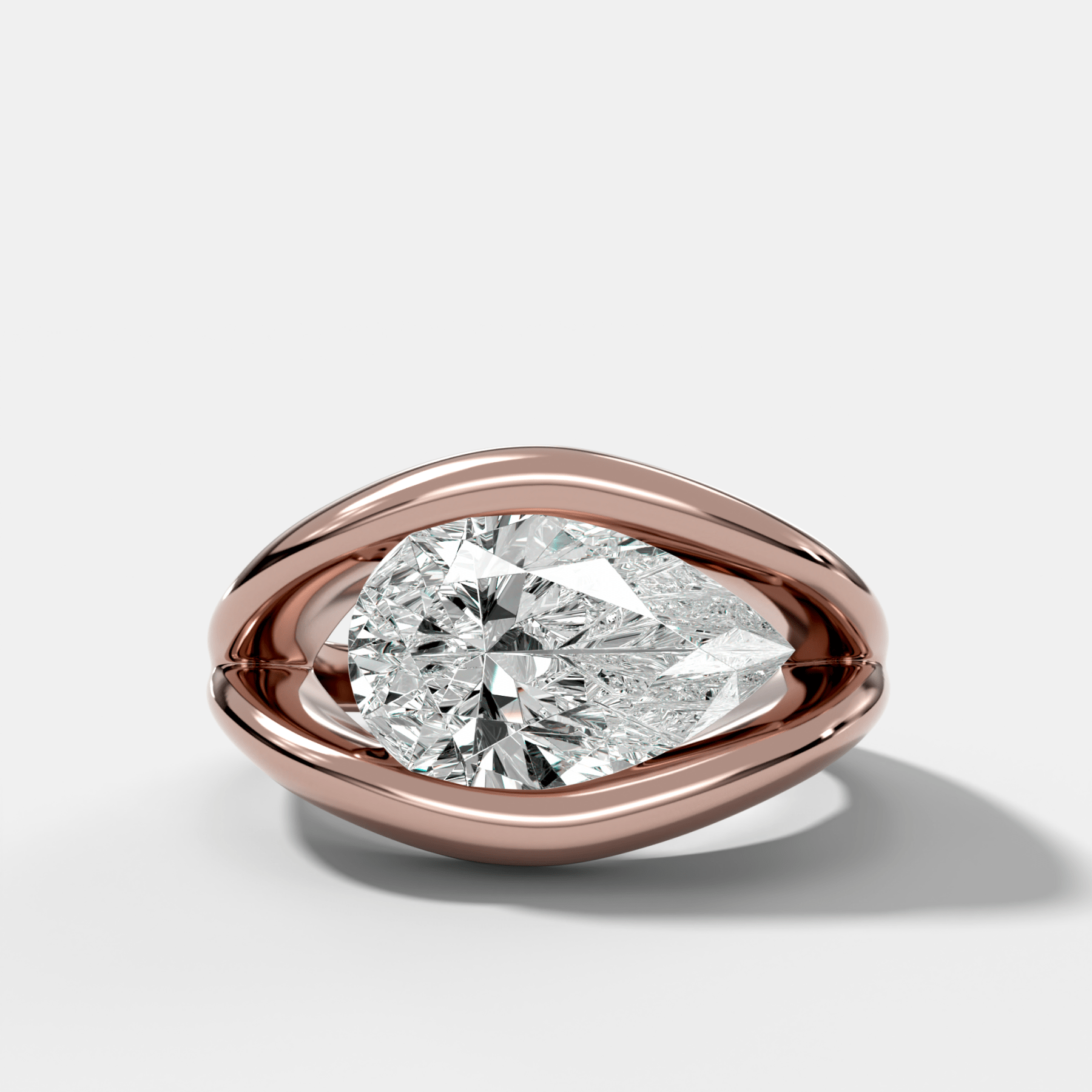 Iris Engagement Ring With a Pear Cut Diamond - GOODSTONE