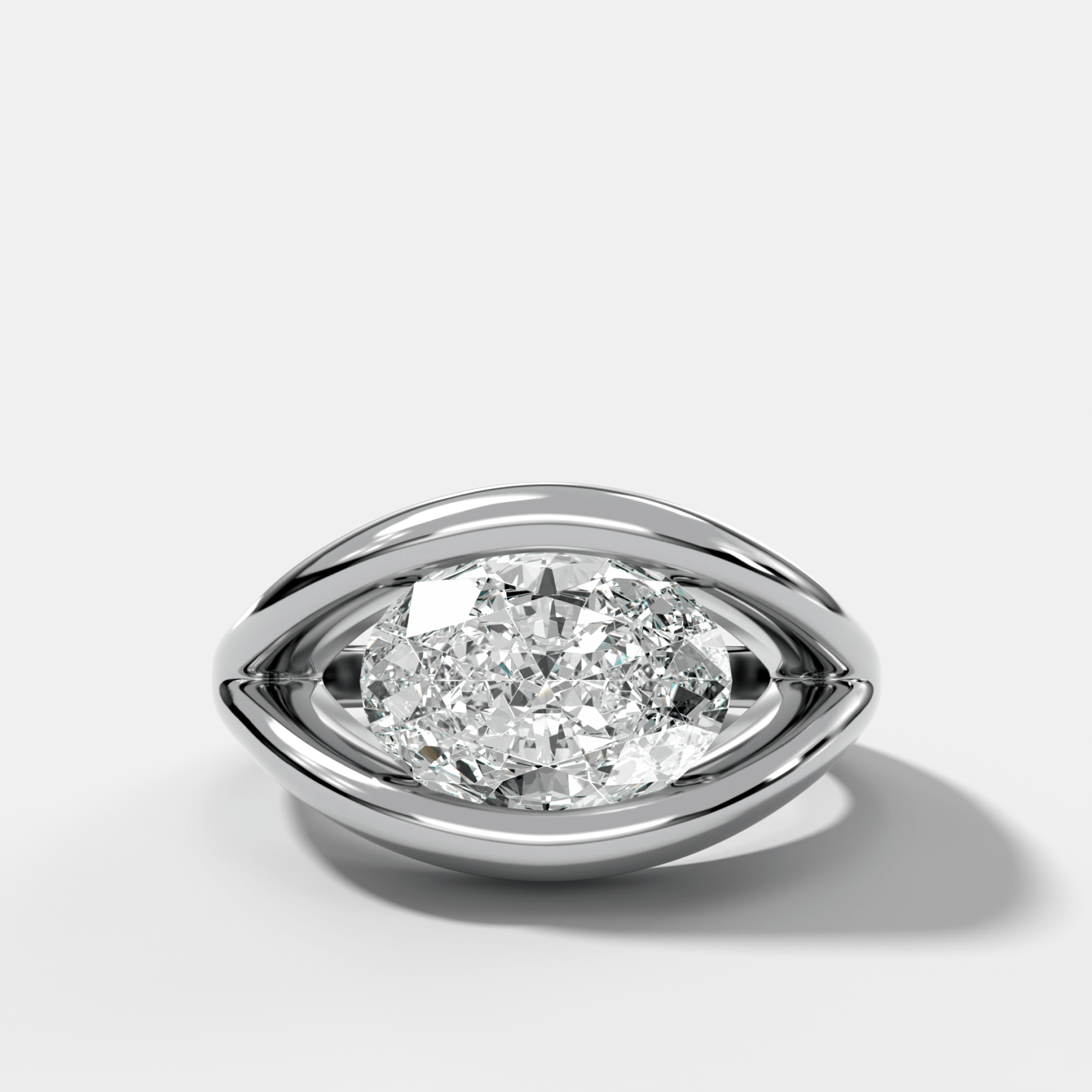 Iris Engagement Ring With an Oval Cut Diamond - GOODSTONE
