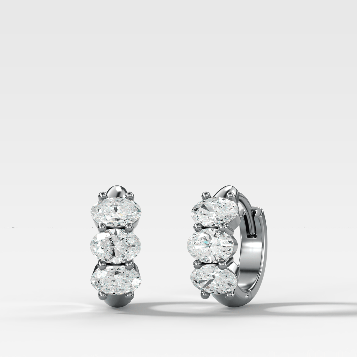 Jumbo Shared Prong Huggies with Oval Cut Diamonds - GOODSTONE