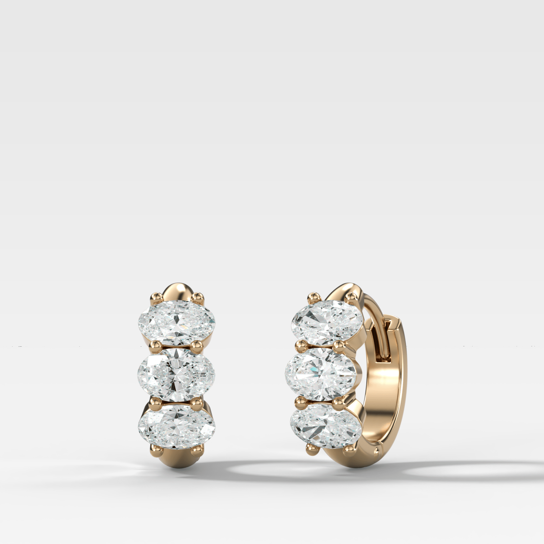 Jumbo Shared Prong Huggies with Oval Cut Diamonds - GOODSTONE