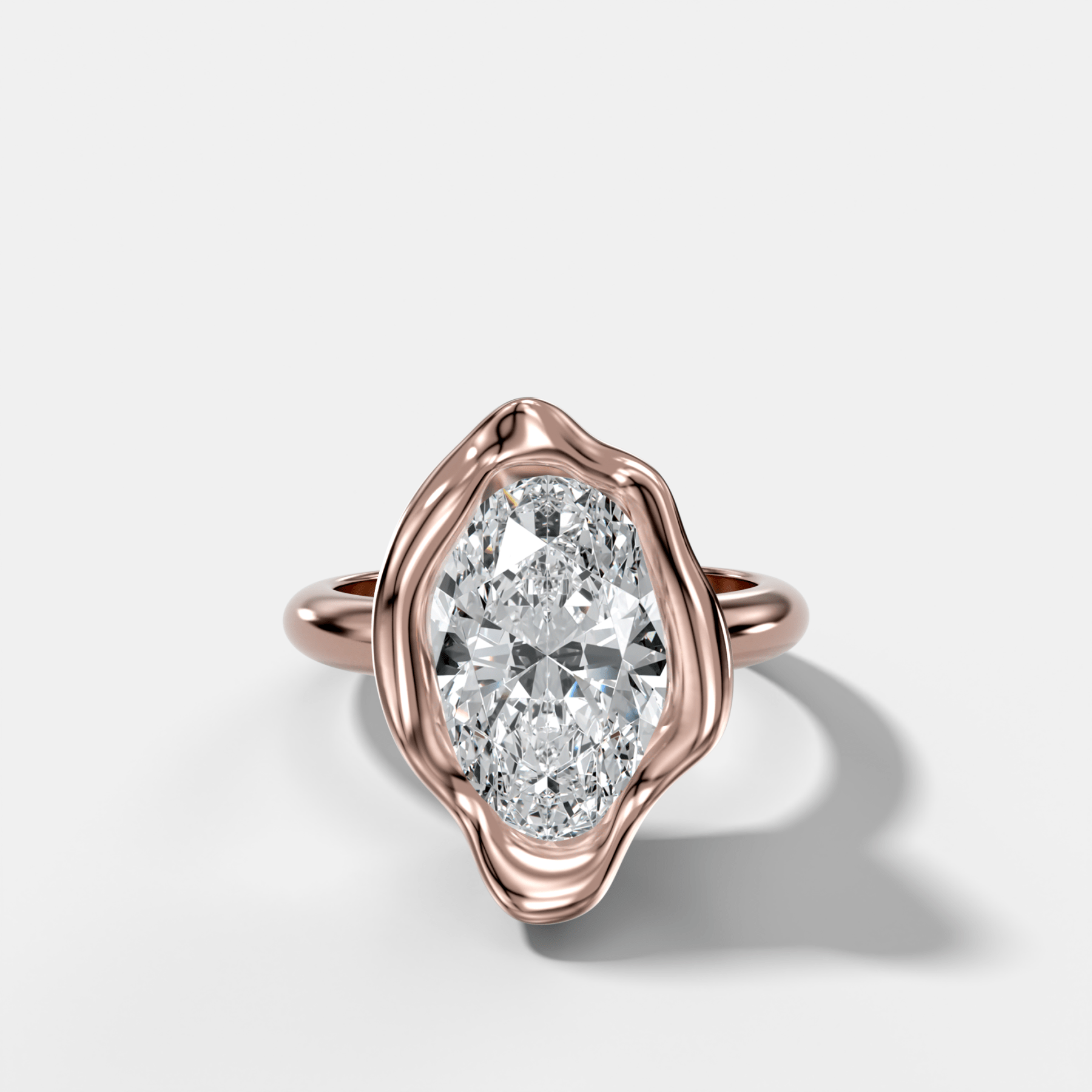 Molten Bezel Engagement Ring With an Oval Cut Diamond - GOODSTONE