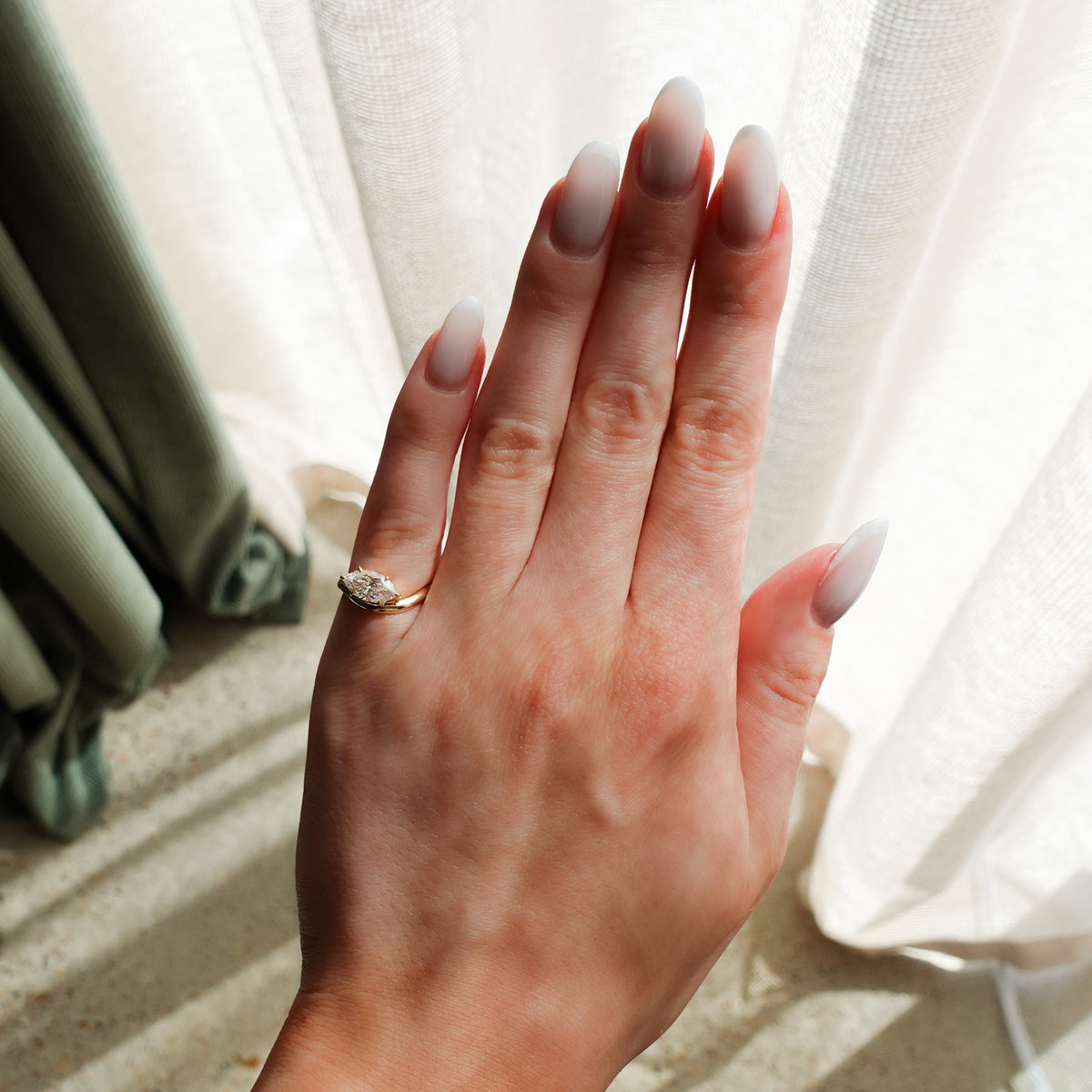 Contoured Engagement Ring with a Marquise Cut Diamond