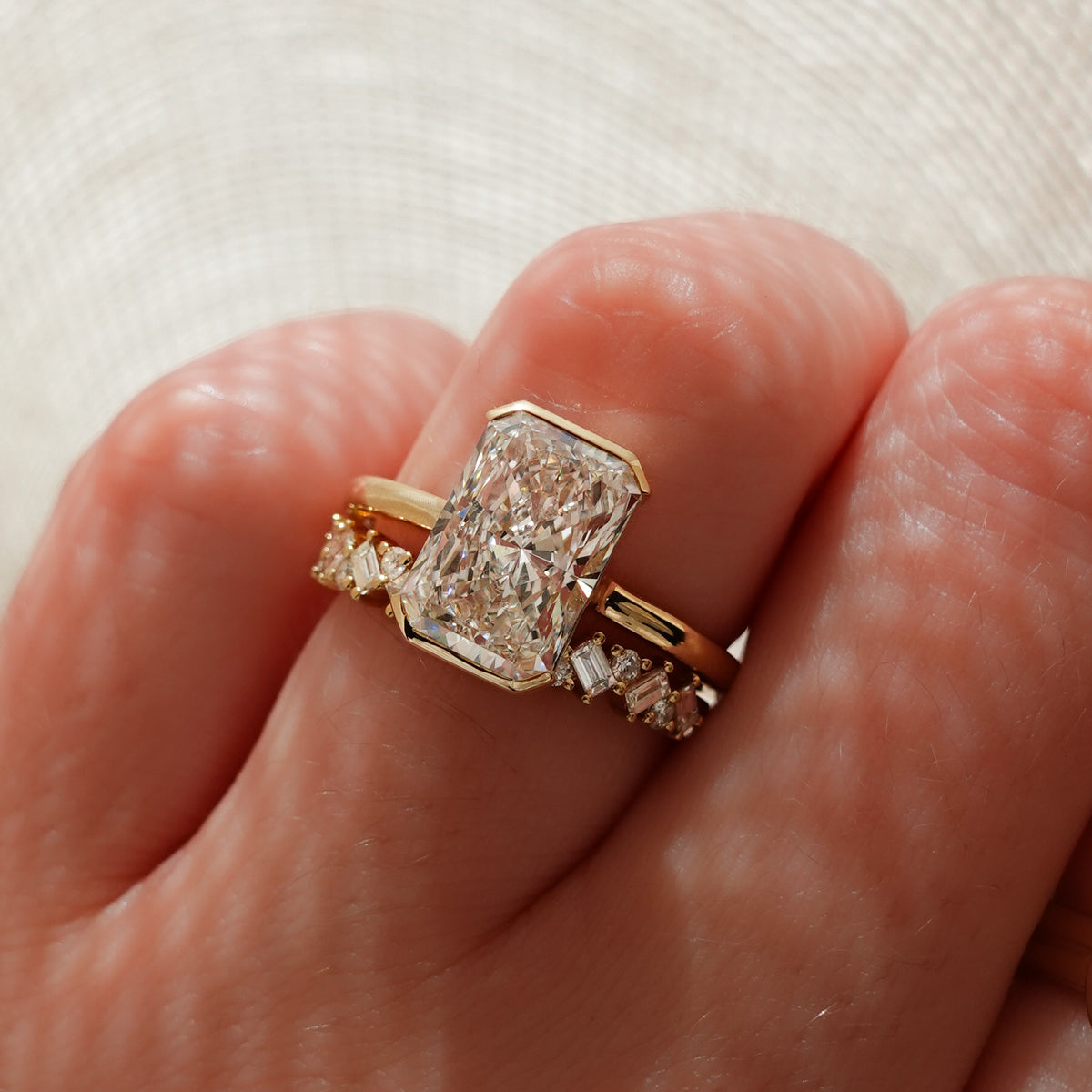 North South Half Bezel Solitaire Engagement Ring With Elongated Radiant Cut Diamond