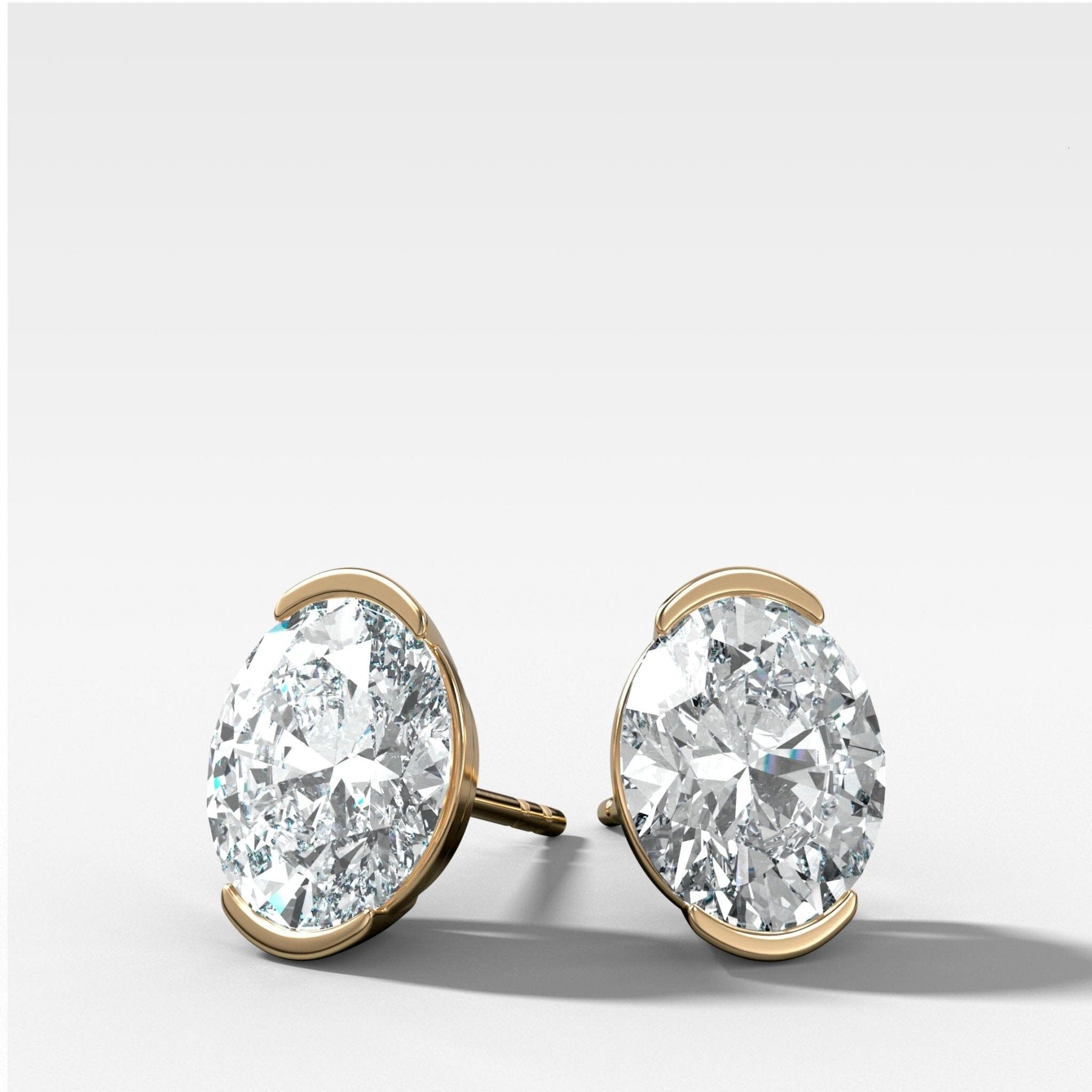 Oval Cut Half Bezel Diamond Studs - GOODSTONE