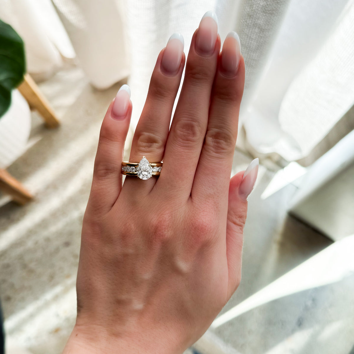 Chunky Channel Set Engagement Ring with Pear Cut Diamond