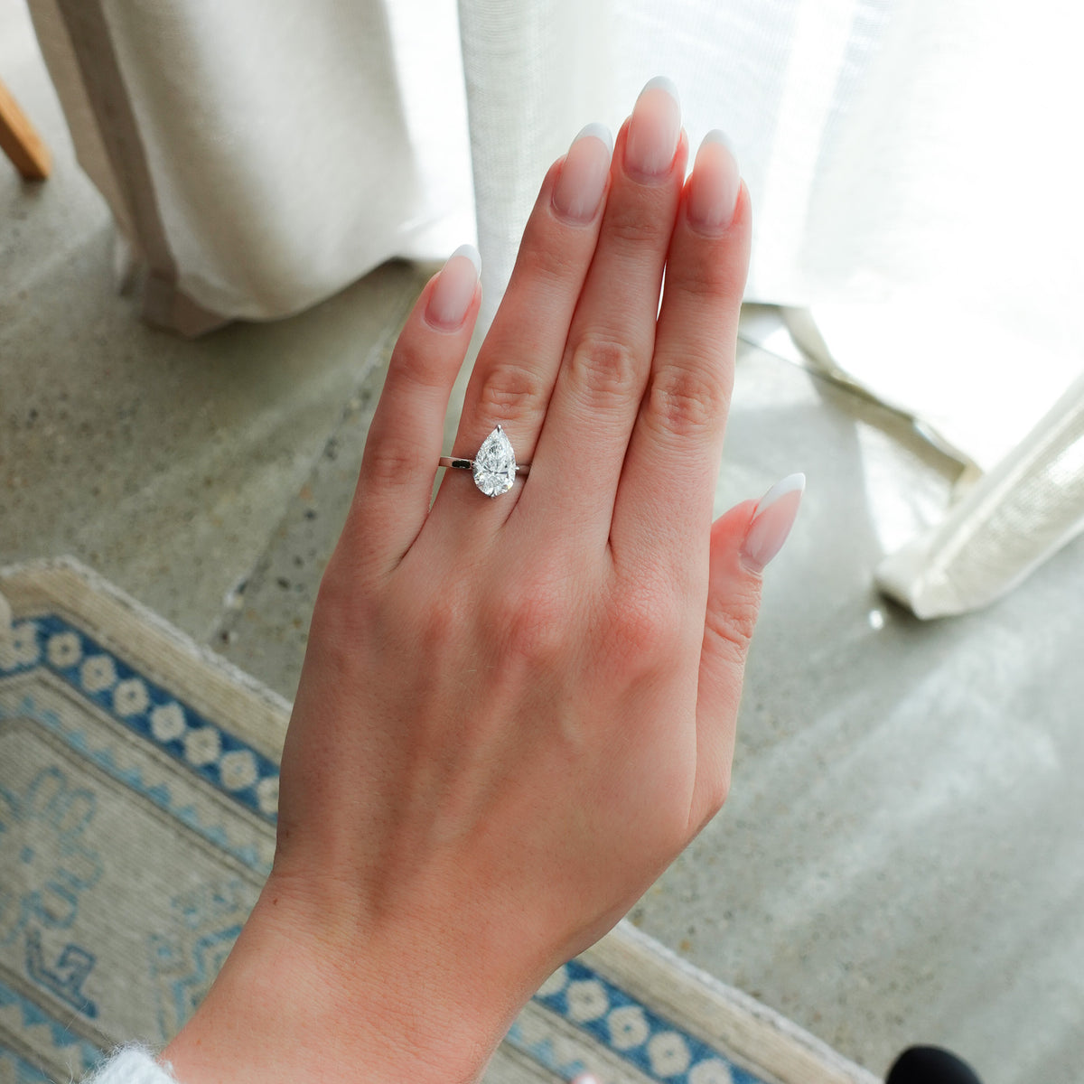 Compass Solitaire Engagement Ring with Pear Cut Diamond