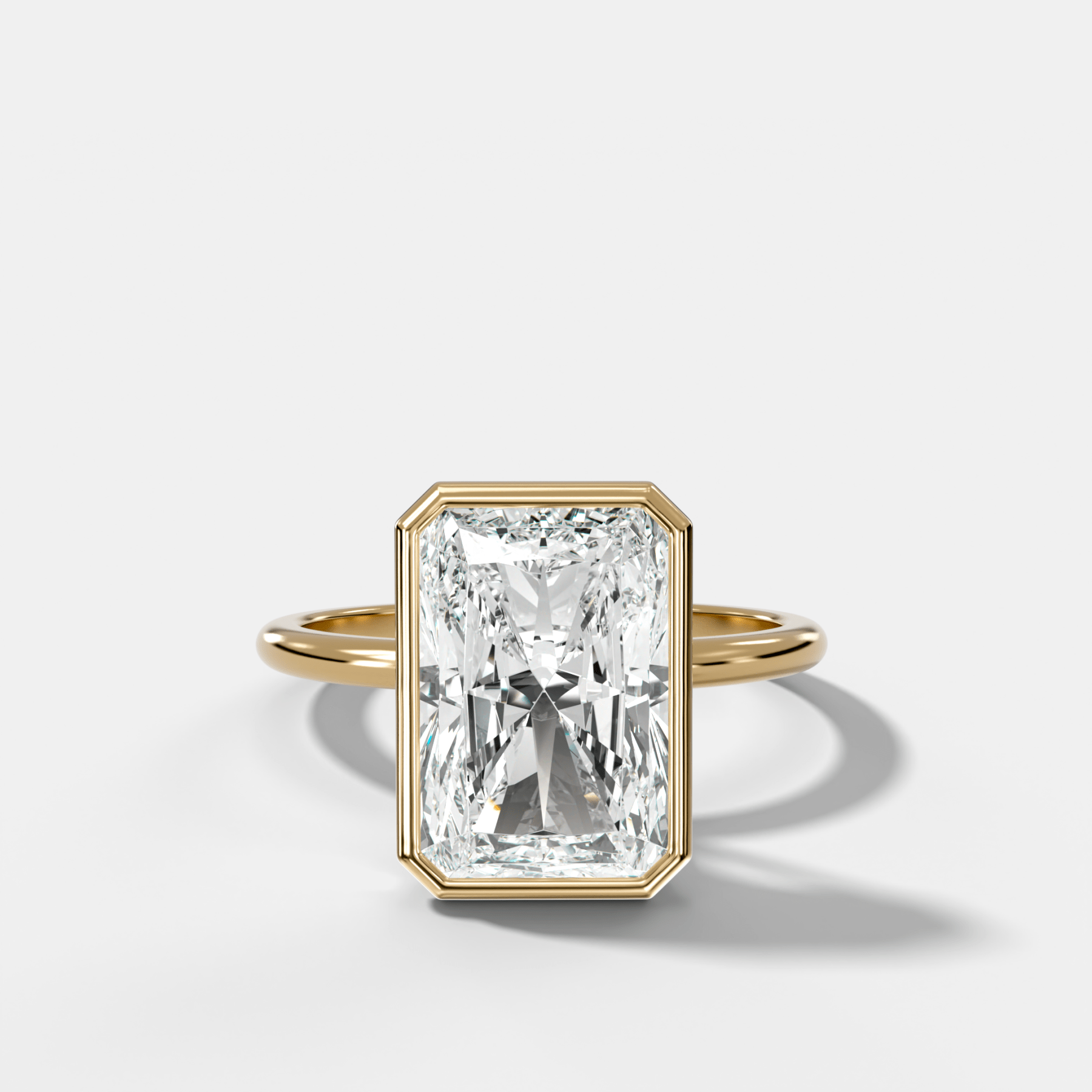 Penumbra Bezel Hidden Halo Engagement Ring with Elongated Radiant Cut - GOODSTONE