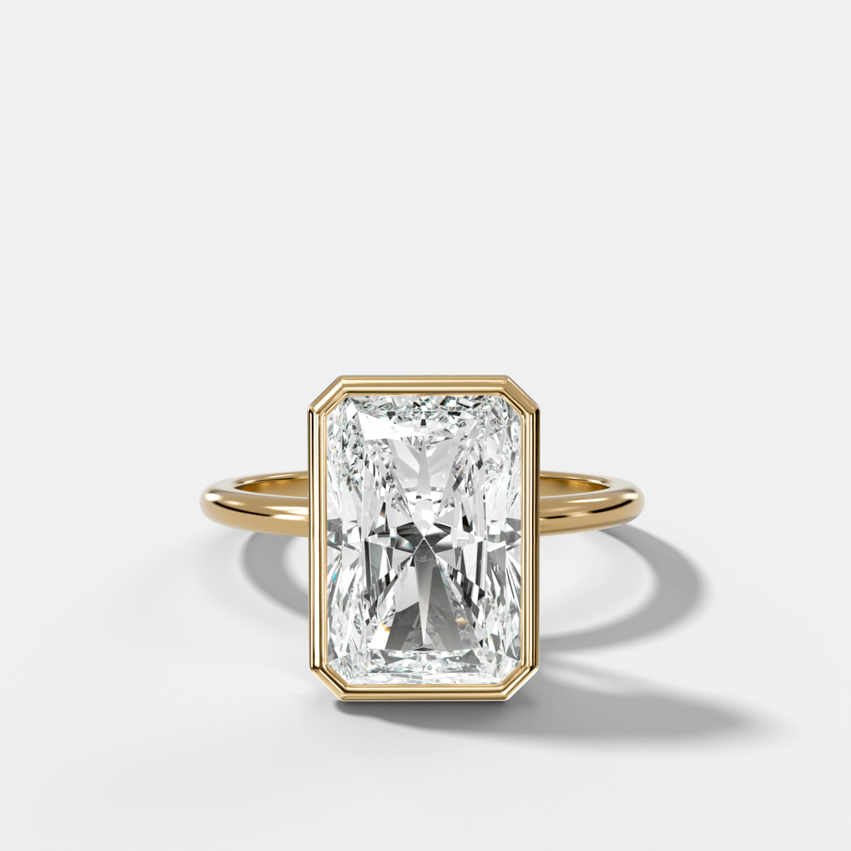 Penumbra Bezel Hidden Halo Engagement Ring with Elongated Radiant Cut - GOODSTONE