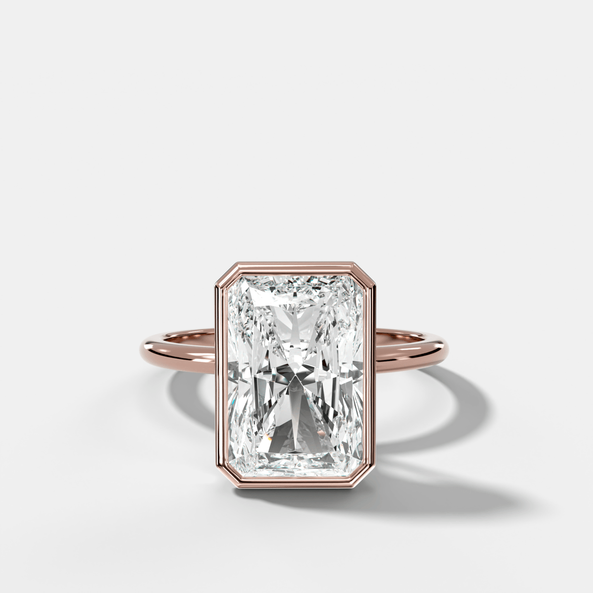 Penumbra Bezel Hidden Halo Engagement Ring with Elongated Radiant Cut - GOODSTONE