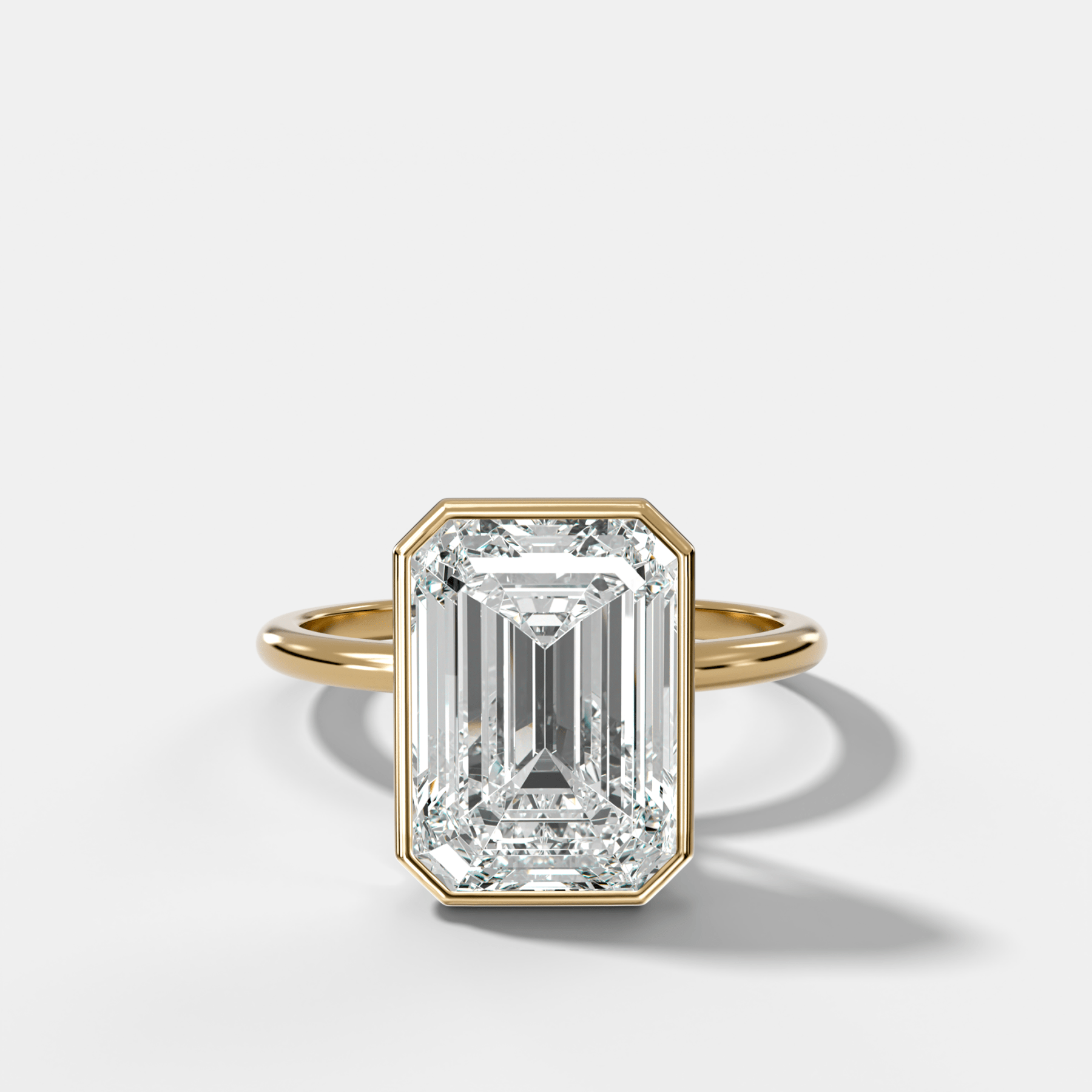 Penumbra Bezel Hidden Halo Engagement Ring with Emerald Cut - GOODSTONE