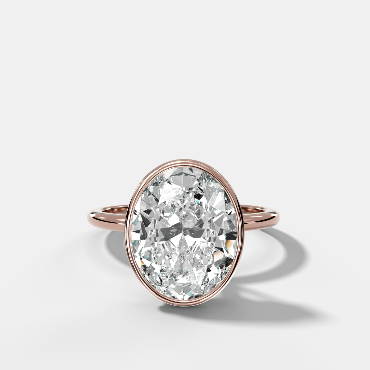 Penumbra Bezel Hidden Halo Engagement Ring with Oval Cut - GOODSTONE