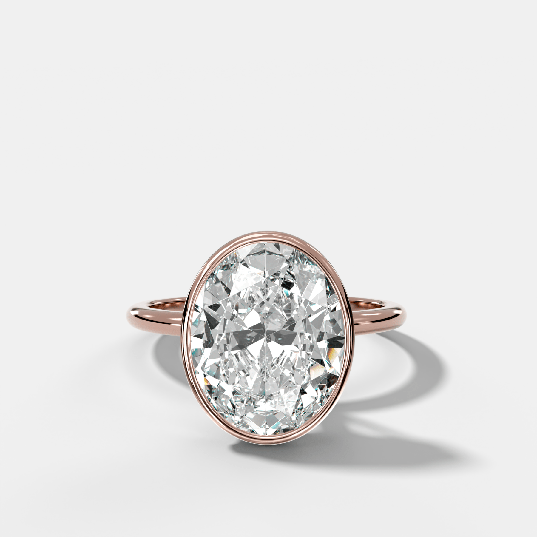 Oval Penumbra Bezel Hidden Halo Engagement Ring | GoodStone