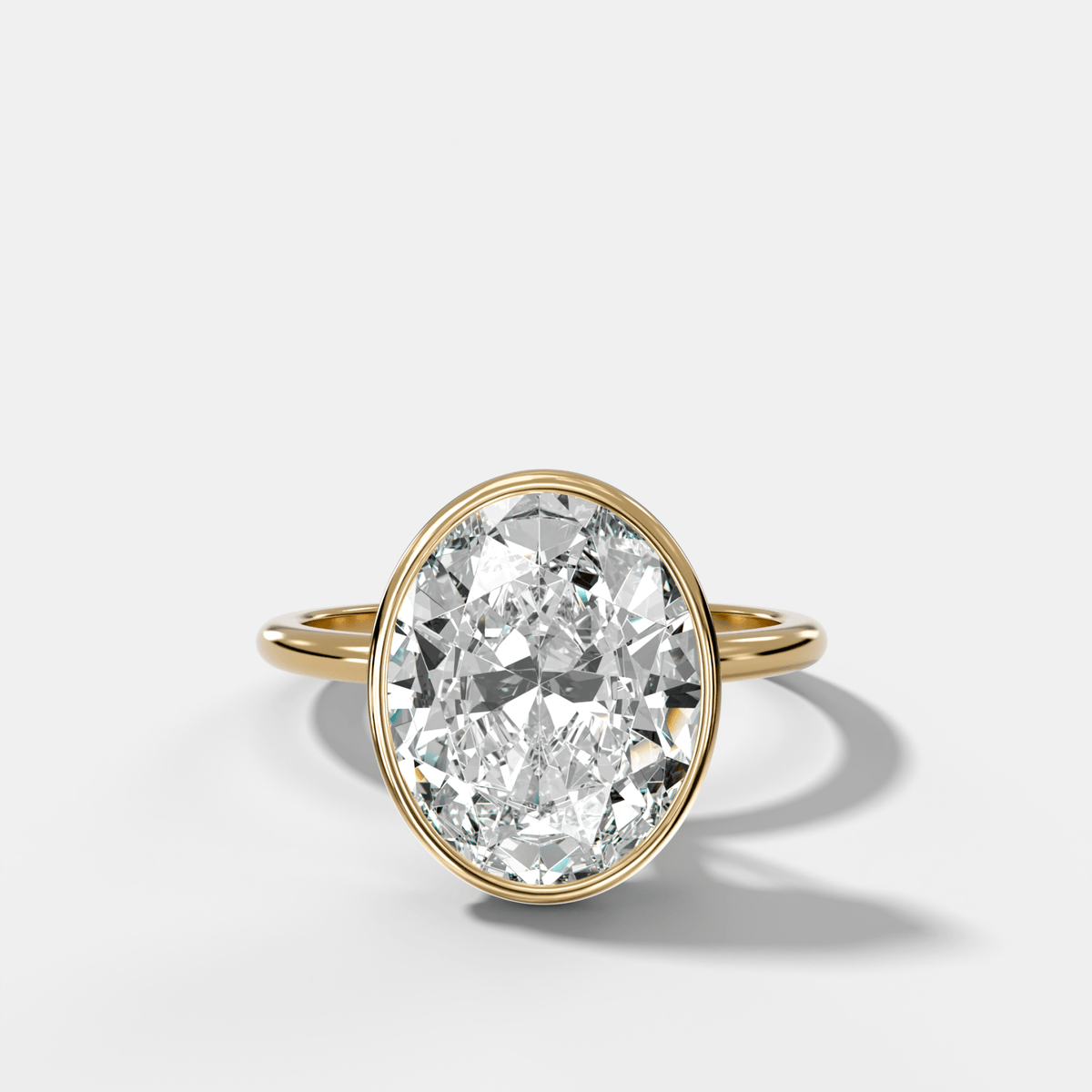 Penumbra Bezel Hidden Halo Engagement Ring with Oval Cut - GOODSTONE