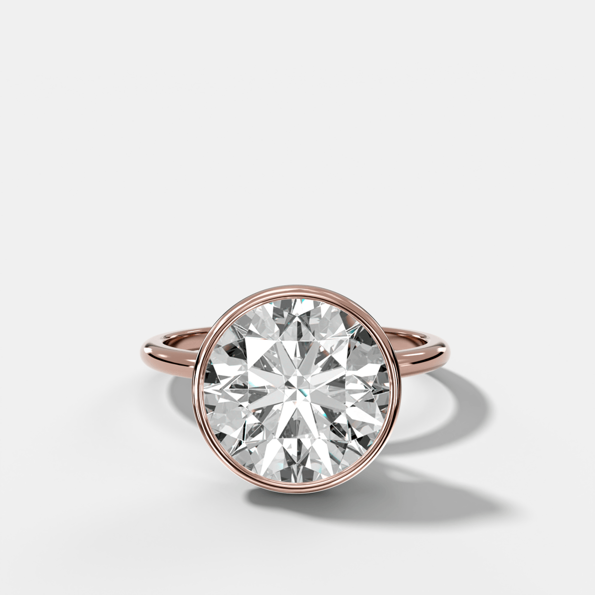 Penumbra Bezel Hidden Halo Engagement Ring with Round Cut - GOODSTONE