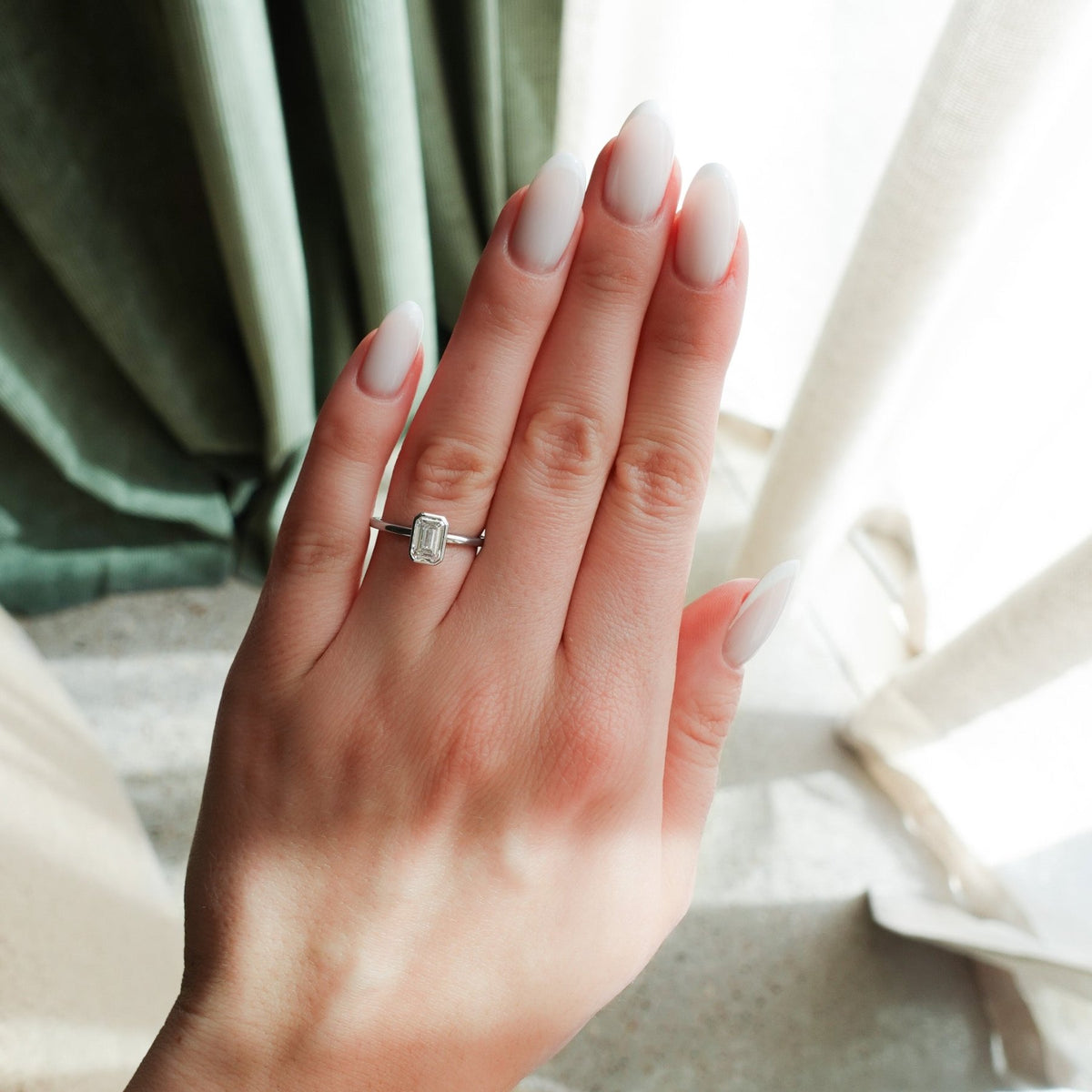 Penumbra Bezel Set Engagement Ring with 1.02ct Lab Grown Emerald Cut Diamond - GOODSTONE