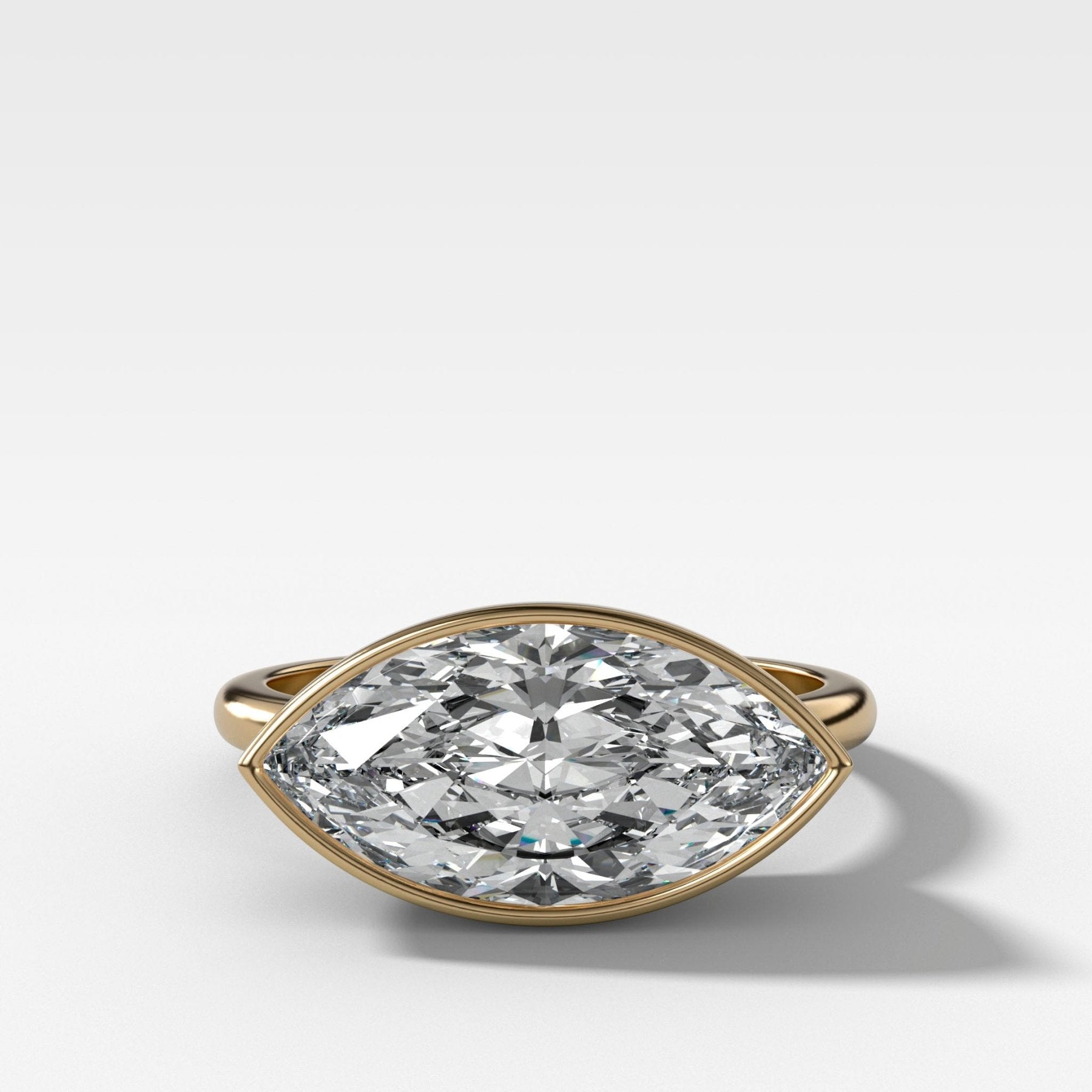 Penumbra Bezel Set Engagement Ring With East West Marquise Cut - GOODSTONE