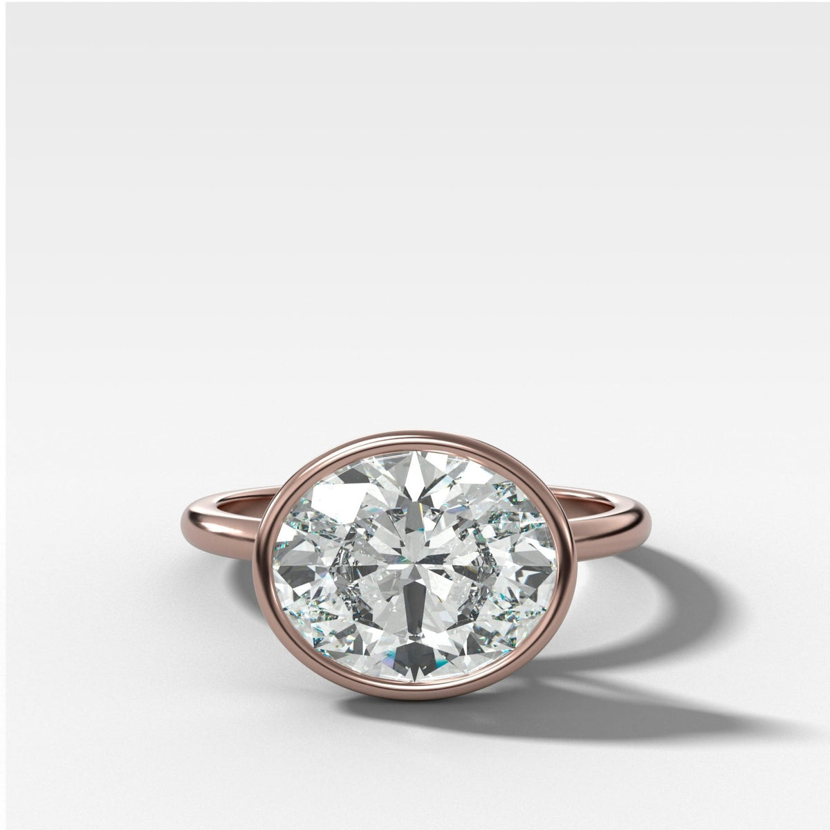 Penumbra Bezel Set Engagement Ring With East West Oval Cut - GOODSTONE