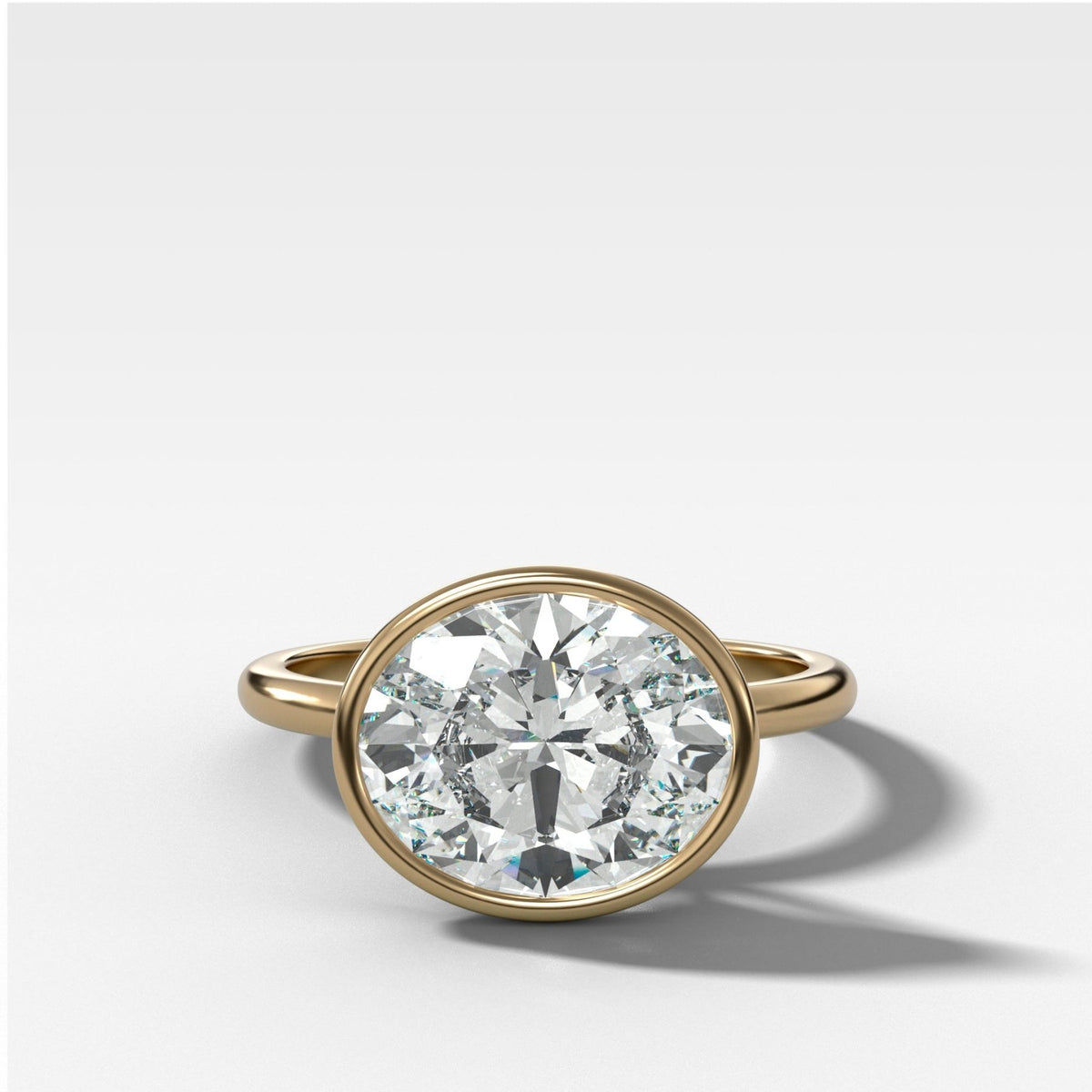 Penumbra Bezel Set Engagement Ring With East West Oval Cut - GOODSTONE