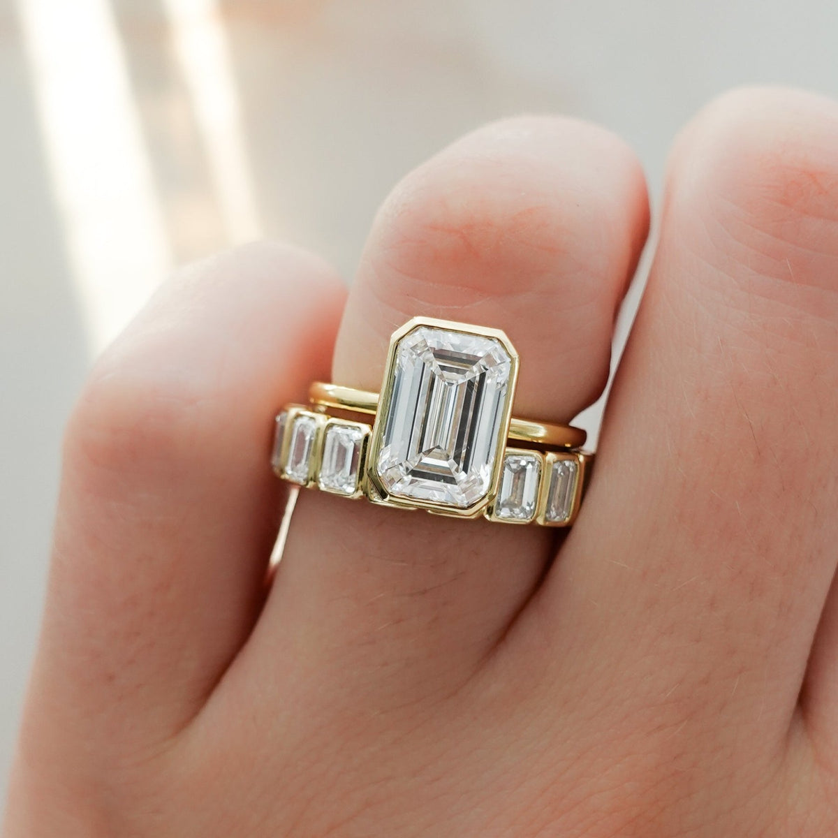 Penumbra Bezel Set Engagement Ring With Emerald Cut - GOODSTONE