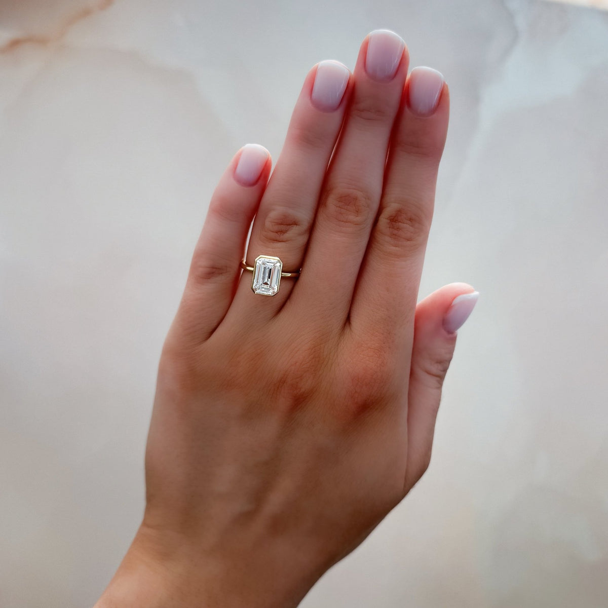 Penumbra Bezel Set Engagement Ring With Emerald Cut - GOODSTONE