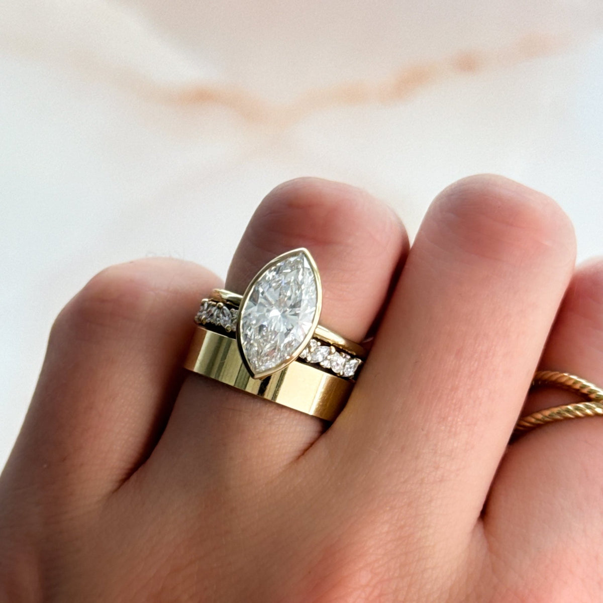 Penumbra Bezel Set Engagement Ring With Marquise Cut - GOODSTONE