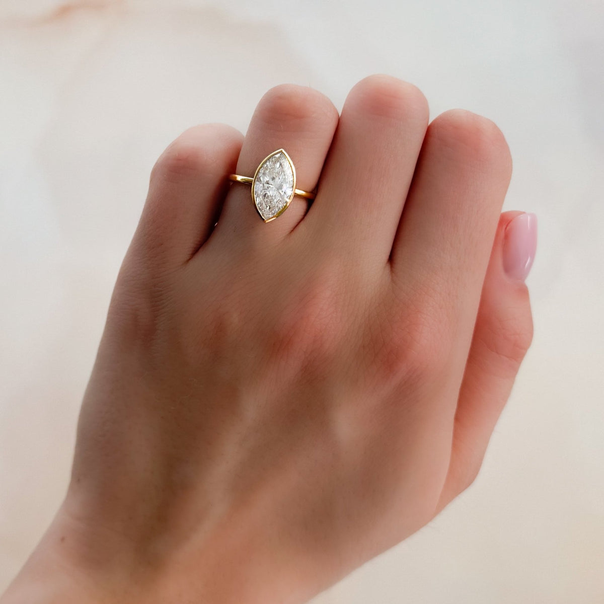 Penumbra Bezel Set Engagement Ring With Marquise Cut - GOODSTONE