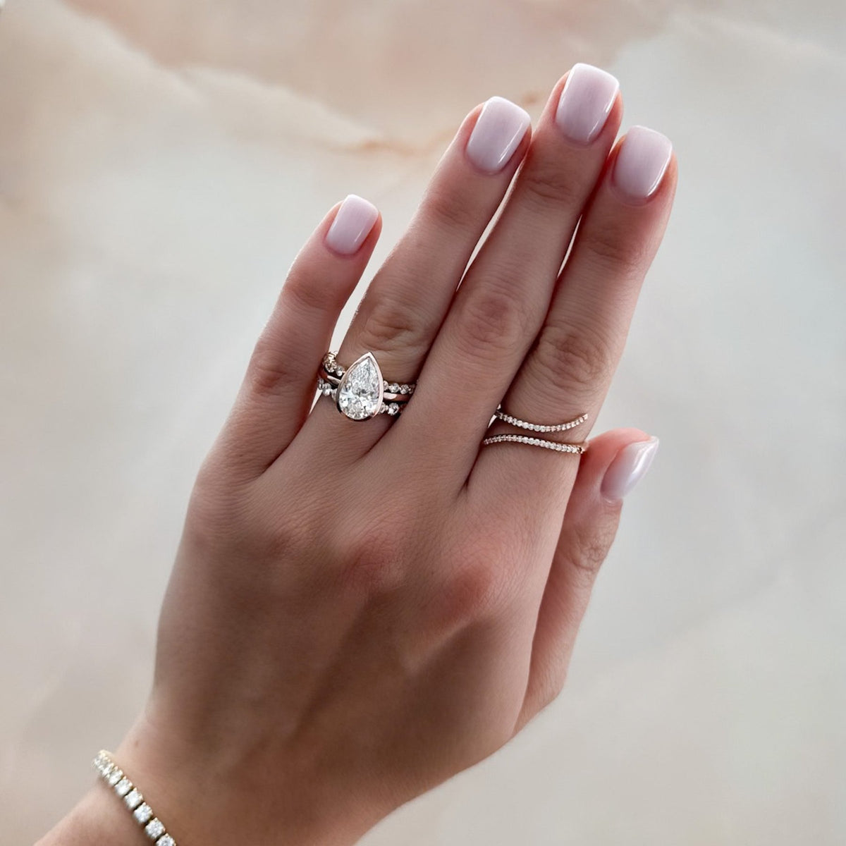 Penumbra Bezel Set Engagement Ring With Pear Cut - GOODSTONE