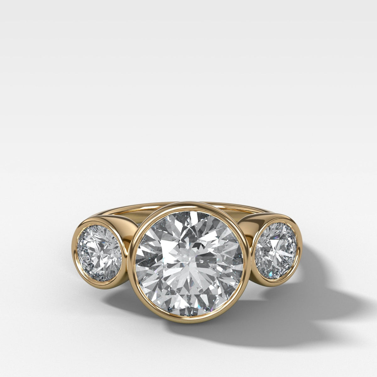 Penumbra Bezel Triad Engagement Ring With 3.14ct Lab Grown Round Cut Diamond - GOODSTONE