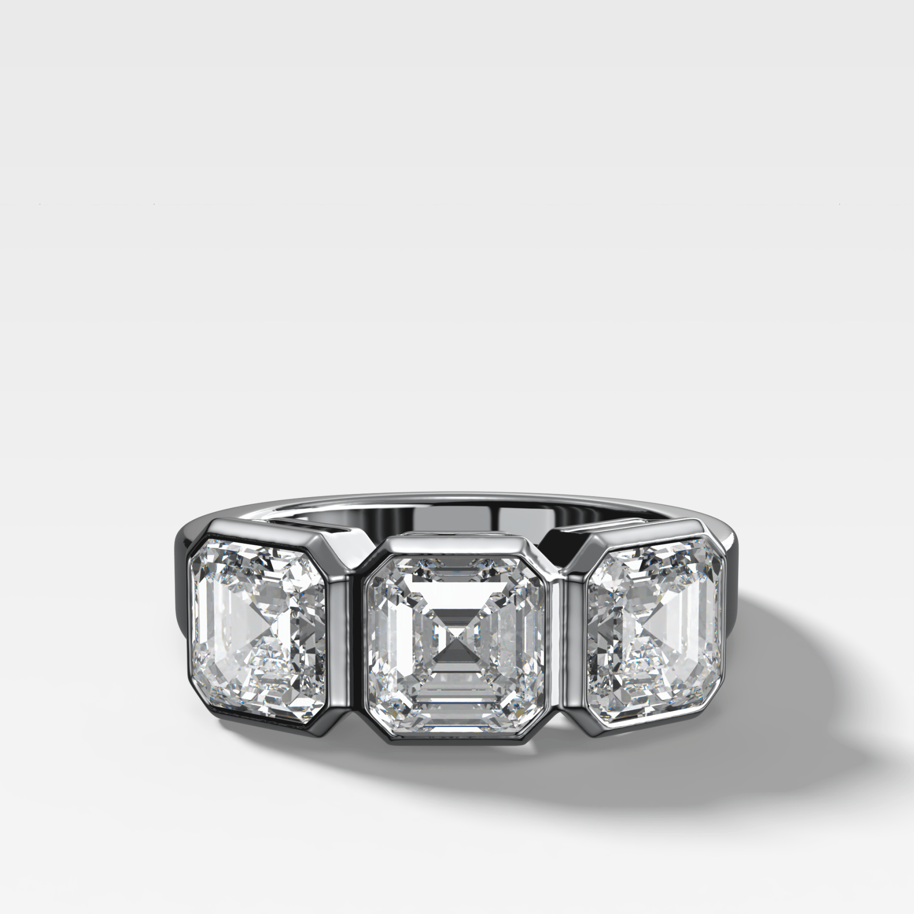 Penumbra Bezel Triad Engagement Ring With Asscher Cut Diamonds - GOODSTONE