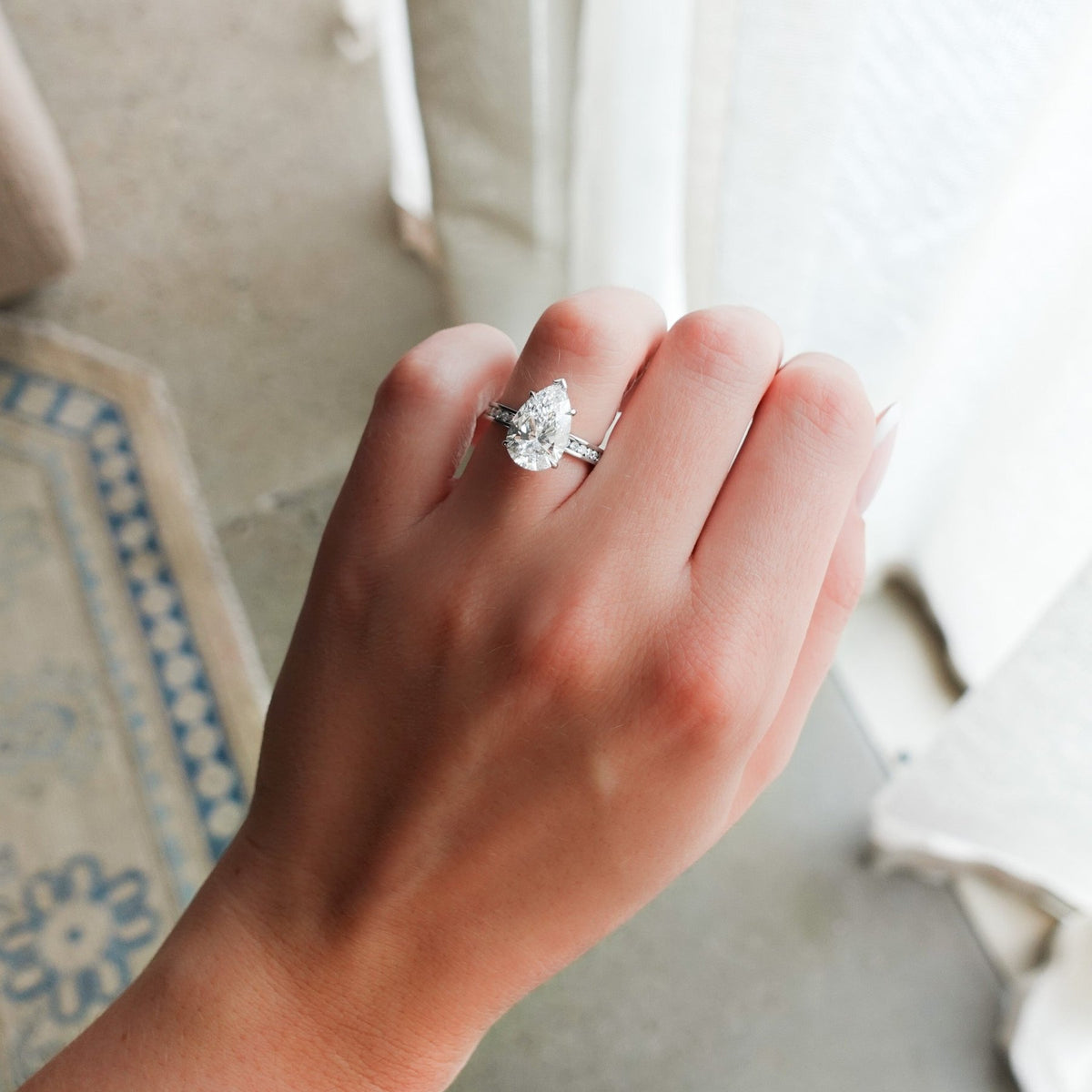 Petite Channel Set Engagement Ring with Pear Cut Diamond - GOODSTONE