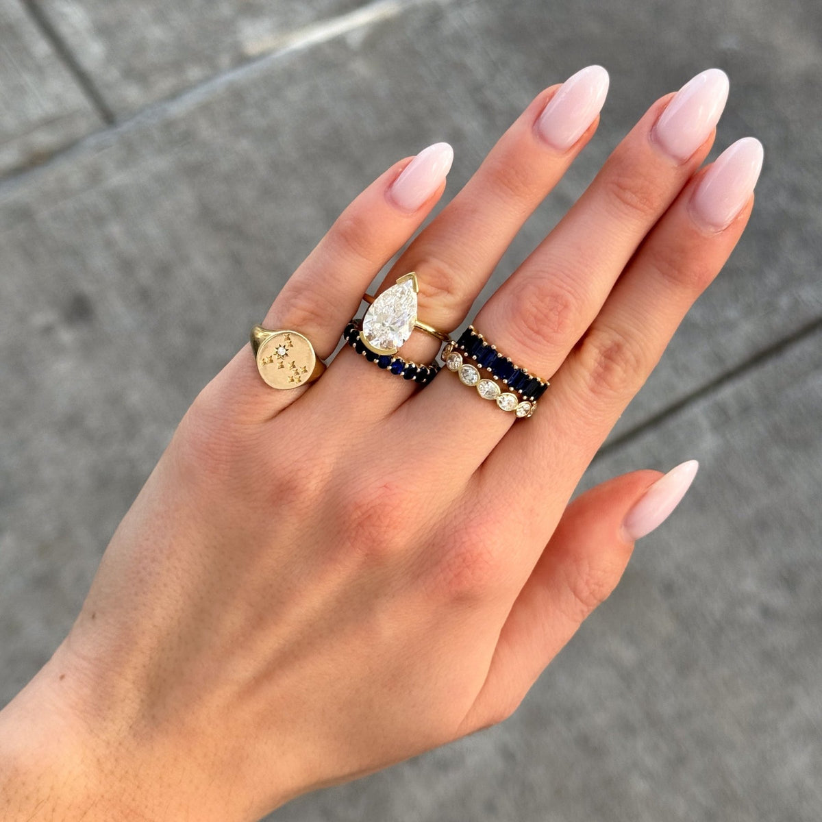 Petite Shared Prong Wedding Band with Blue Sapphire Oval Gemstones - GOODSTONE