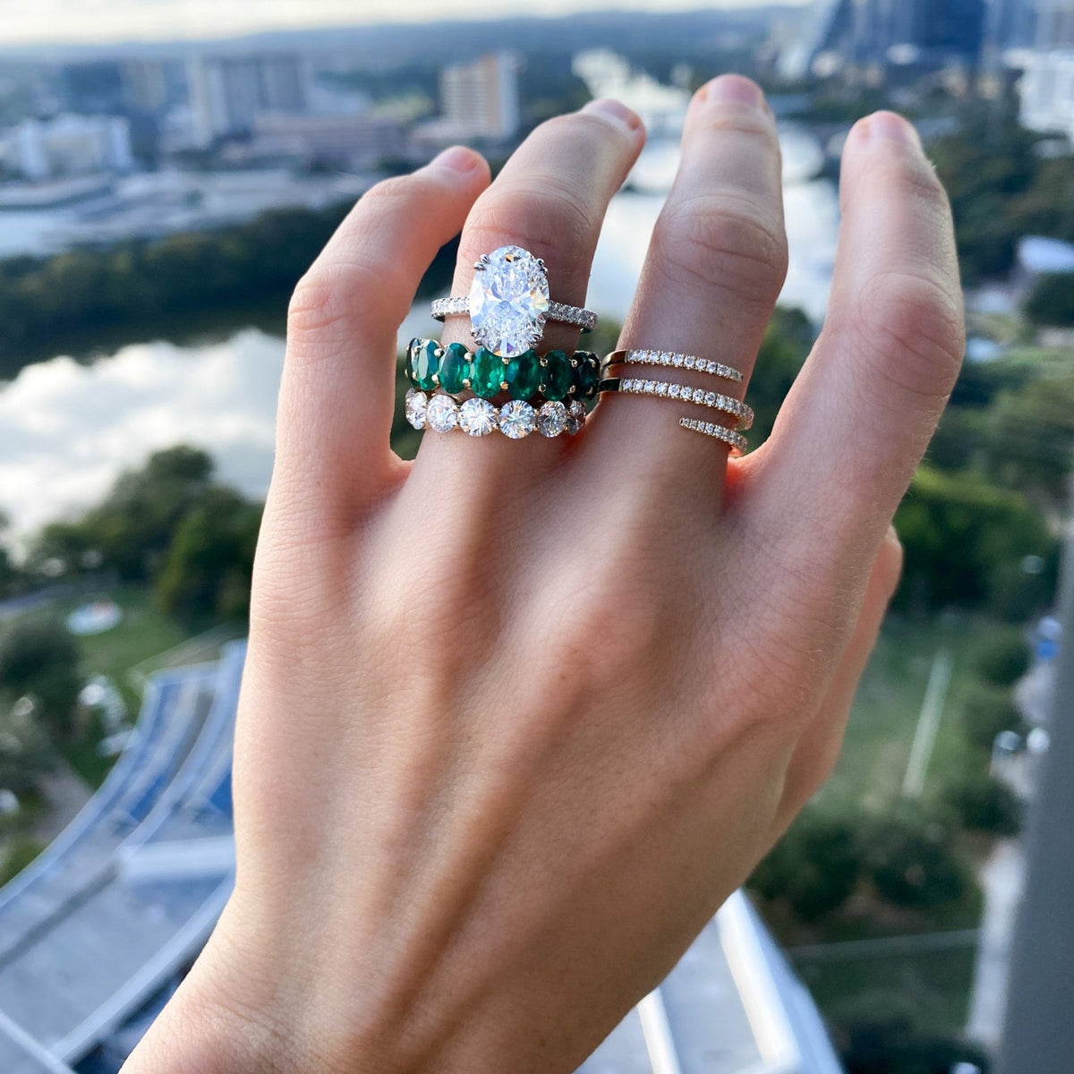 Petite Shared Prong Wedding Band with Green Emerald Oval Gemstones - GOODSTONE