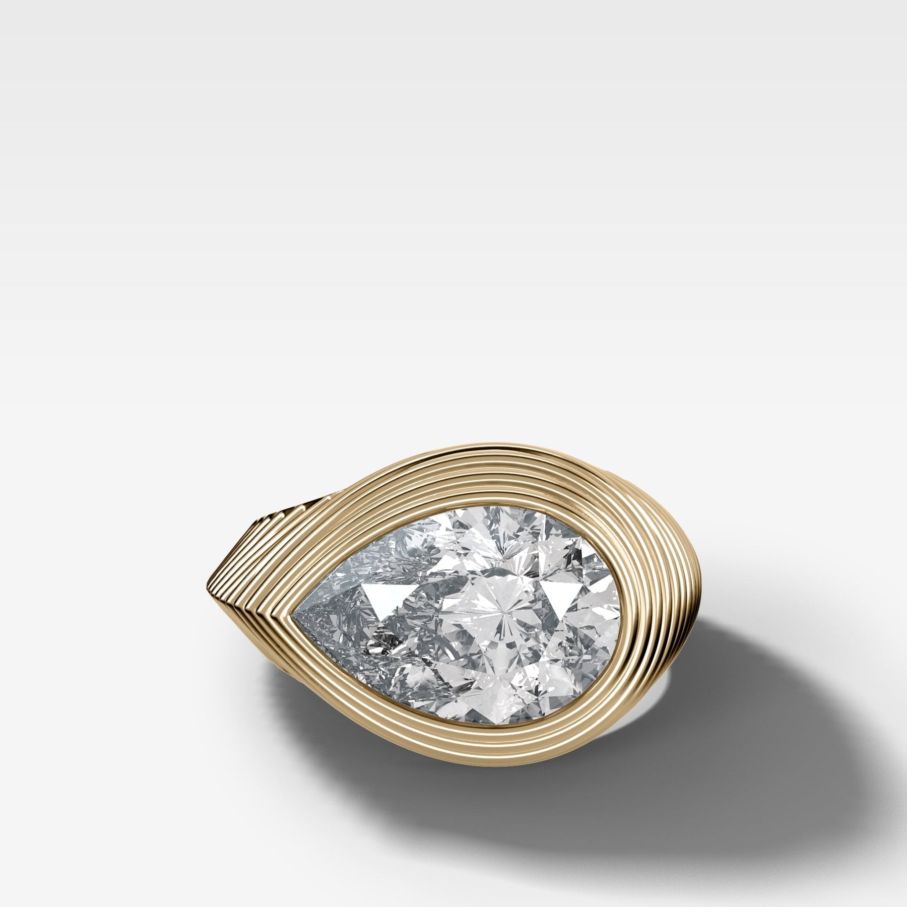 Ripple Solitaire Engagement Ring with East West Pear Cut Diamond - GOODSTONE