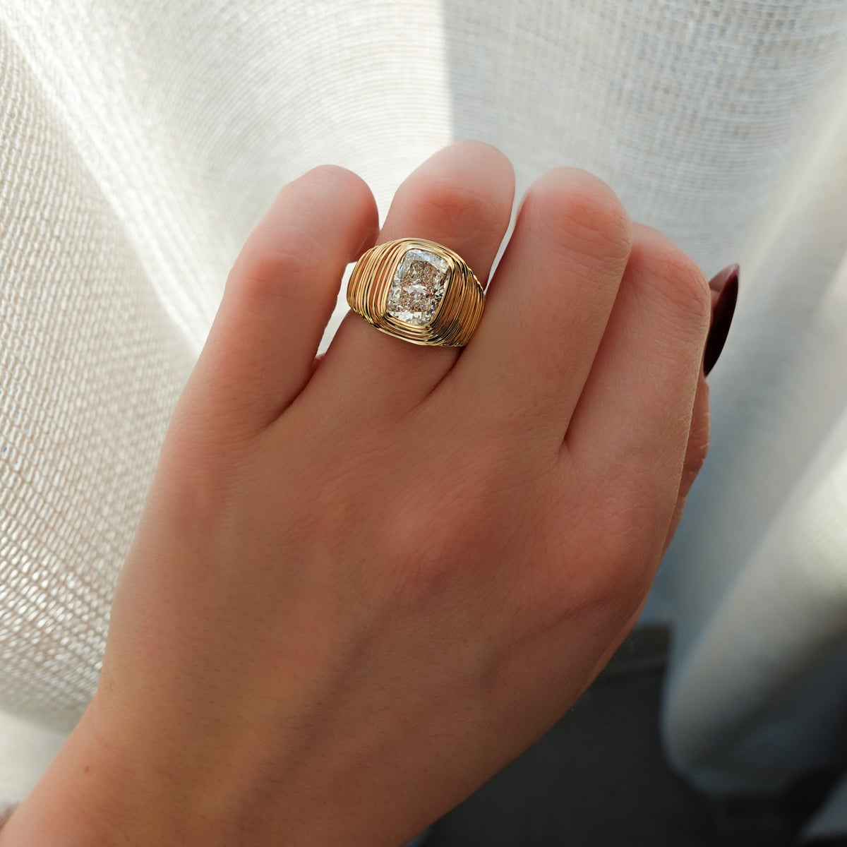 Ripple Solitaire Engagement Ring with Elongated Cushion Cut Diamond