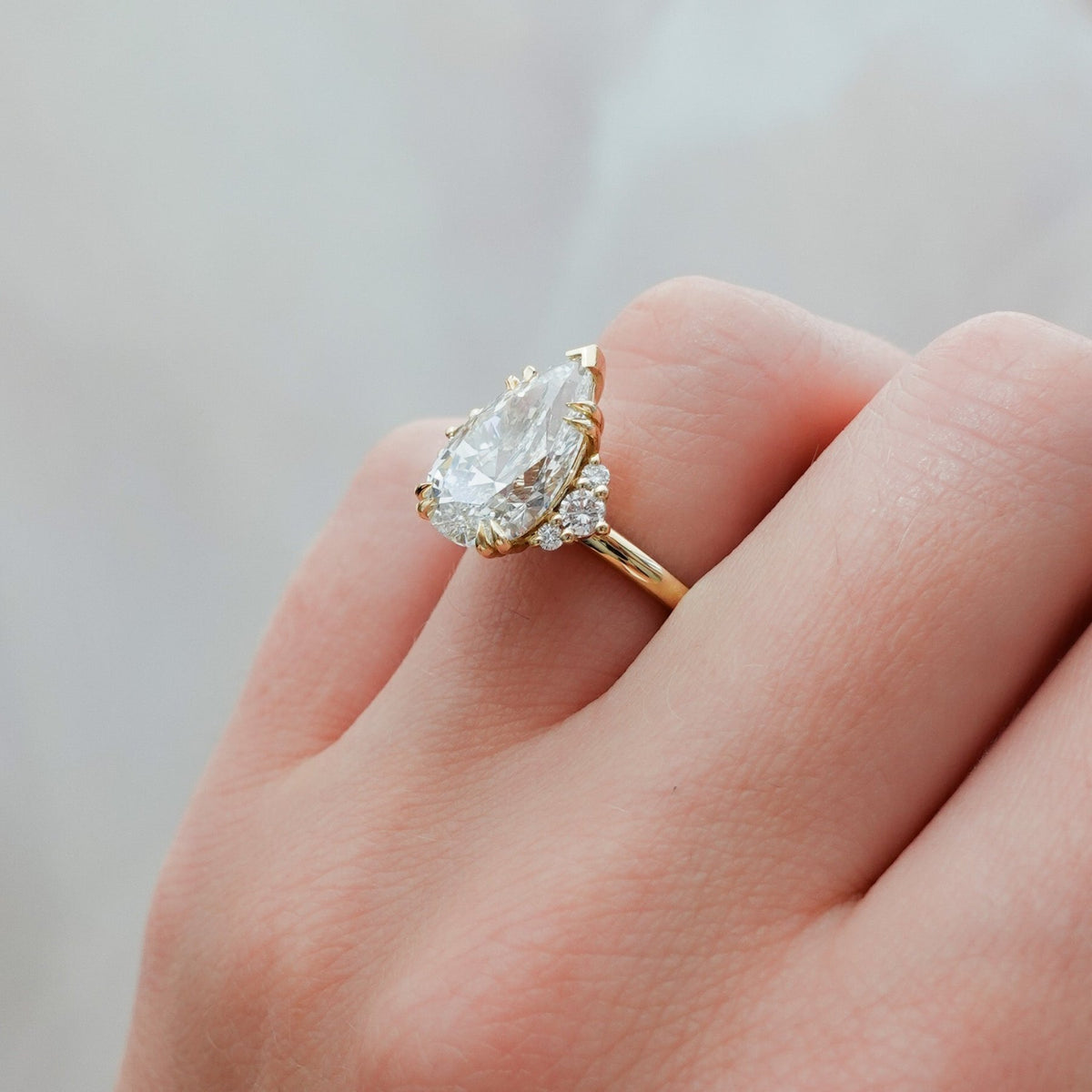 Signature Cluster Engagement Ring With Pear Cut Diamond - GOODSTONE