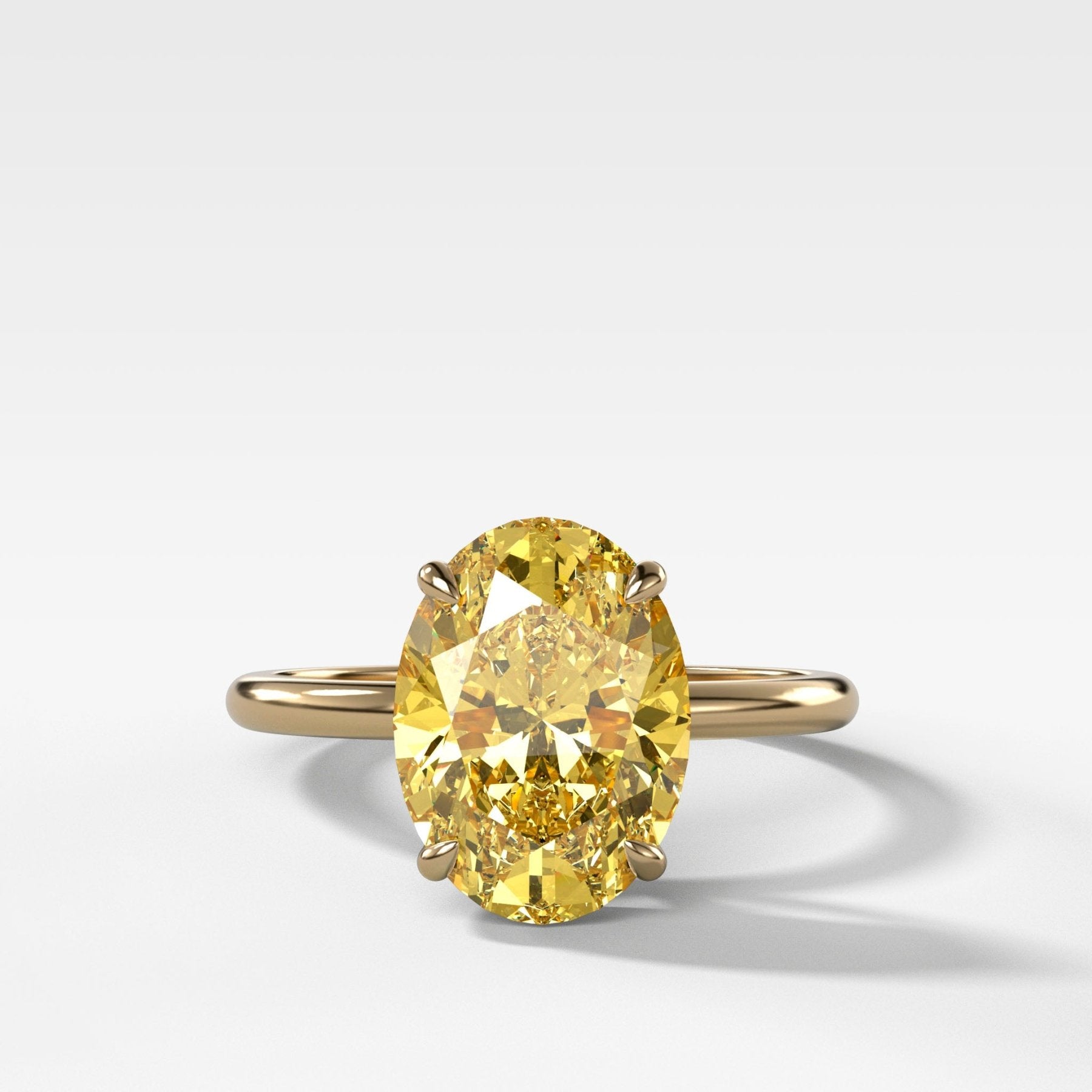 Thin + Simple Solitaire Engagement Ring With Canary Yellow Oval Cut Diamond - GOODSTONE