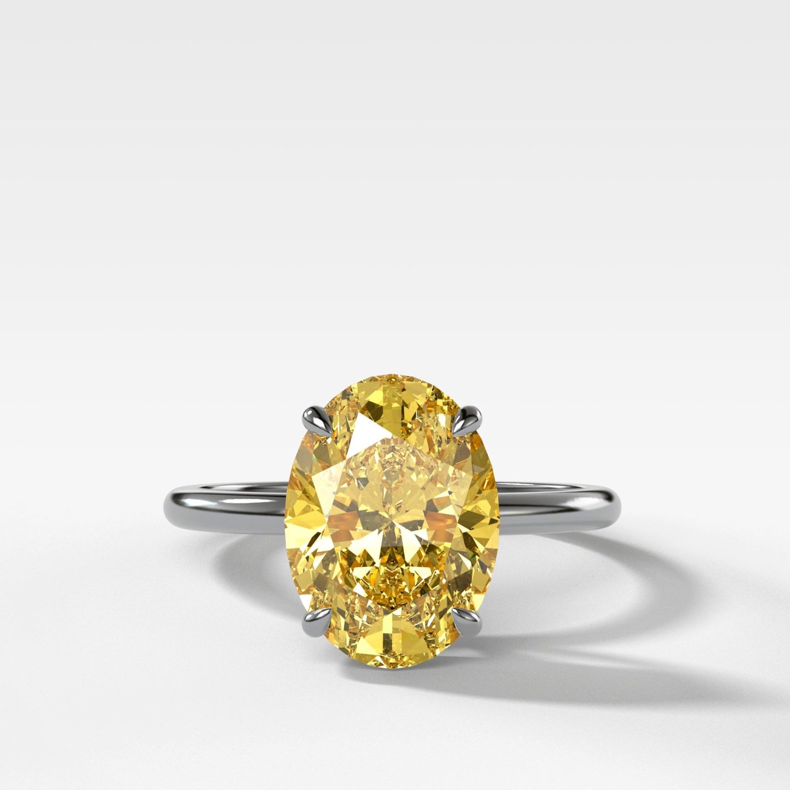 Thin + Simple Solitaire Engagement Ring With Canary Yellow Oval Cut Diamond - GOODSTONE