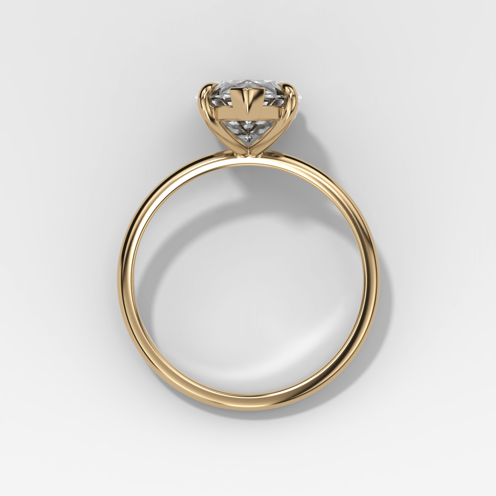 Solitario fino + simple con talla marquesa de Good Stone en oro amarillo