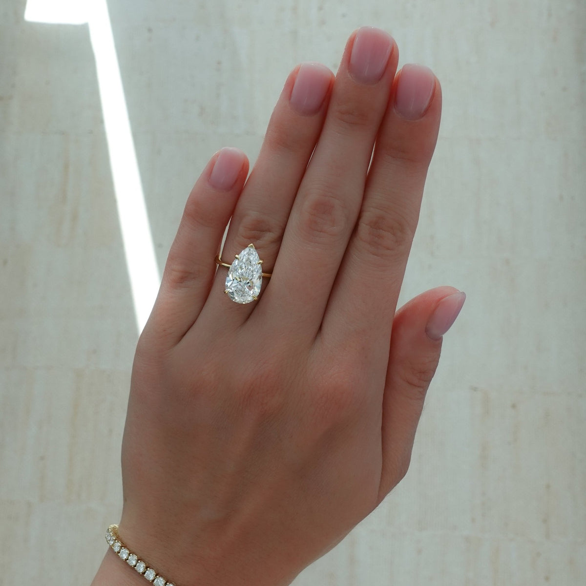 Thin + Simple Solitaire Engagement Ring With Pear Cut Diamond - GOODSTONE