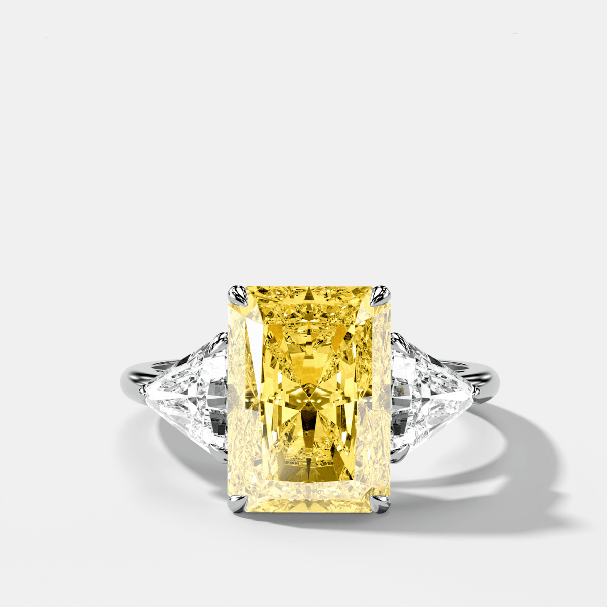 Three Stone Engagement Ring With Canary Yellow Elongated Radiant Diamond and Trilliants - GOODSTONE