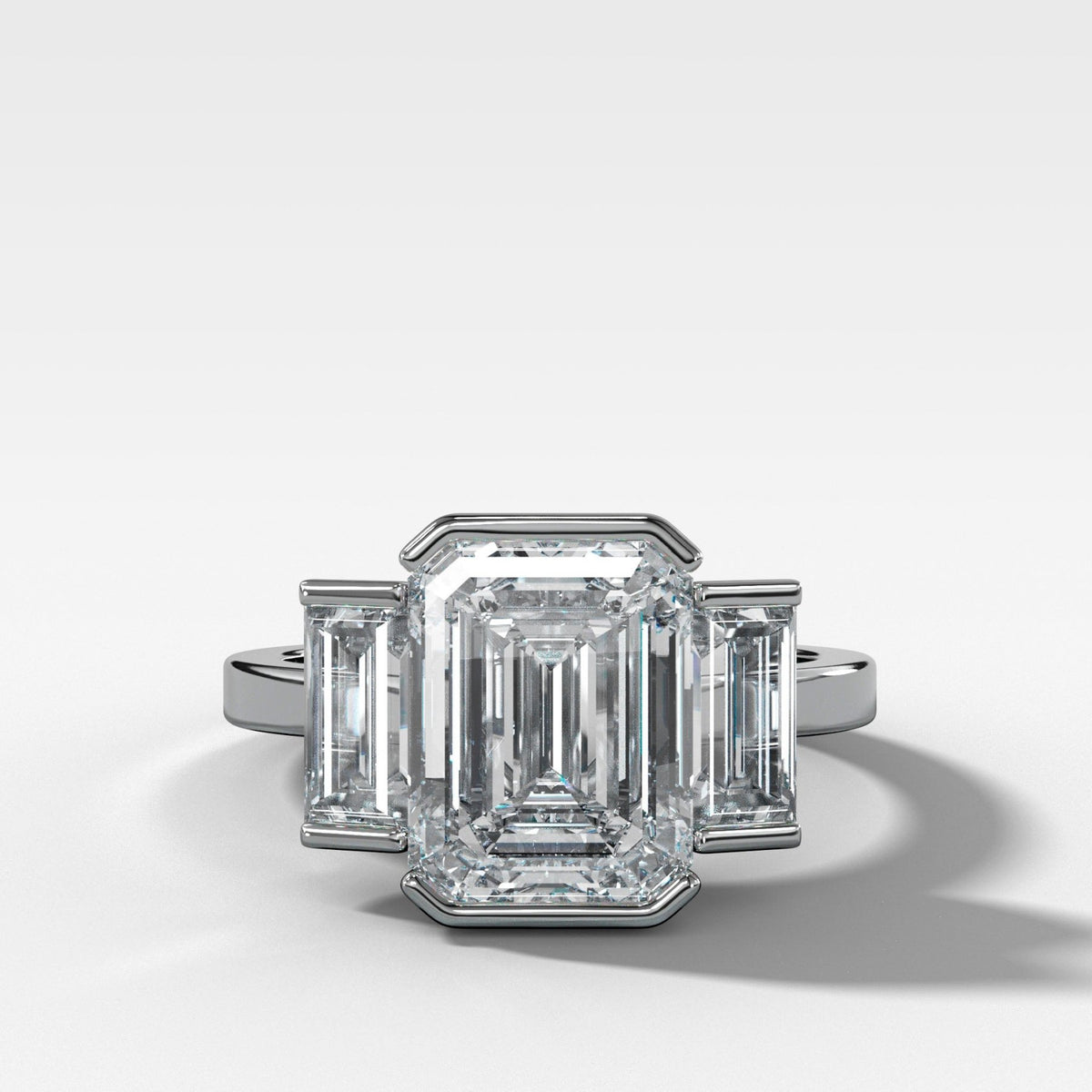 Three Stone Engagement Ring with Half Bezel Baguette Side Stones and Emerald Cut Diamond - GOODSTONE