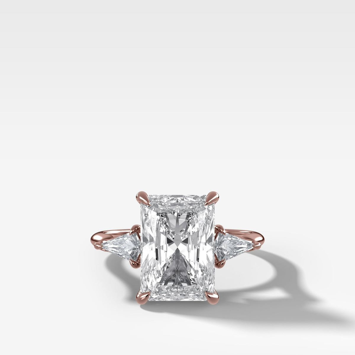 Three Stone Engagement Ring With Kite Side Stones and Elongated Radiant Cut Diamond - GOODSTONE
