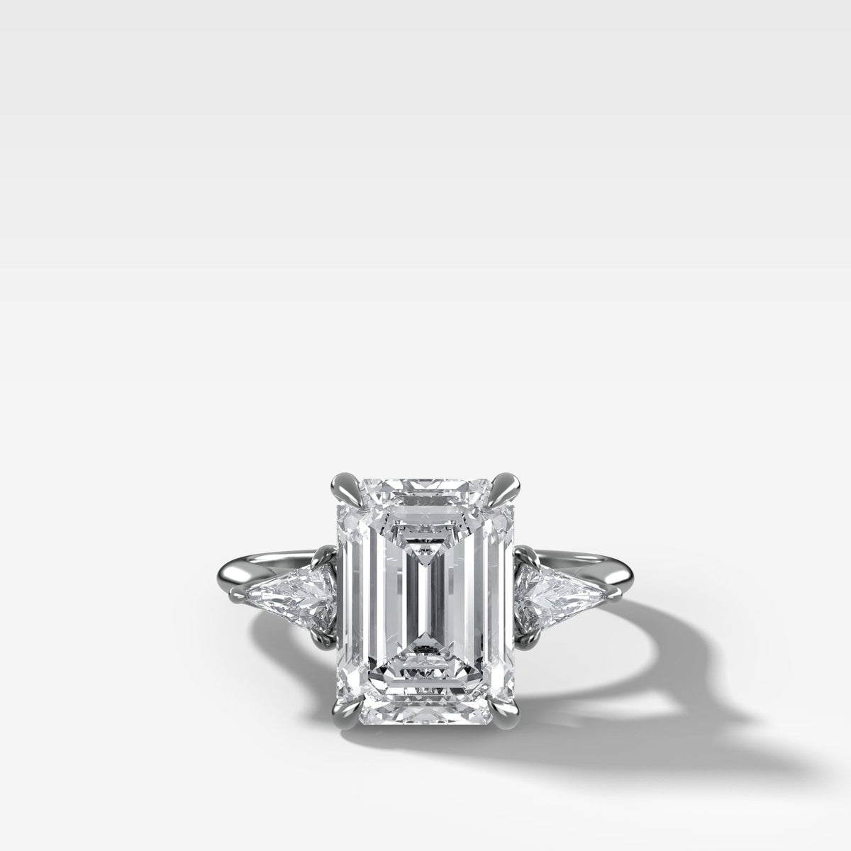 Three Stone Engagement Ring With Kite Side Stones and Emerald Cut Diamond - GOODSTONE