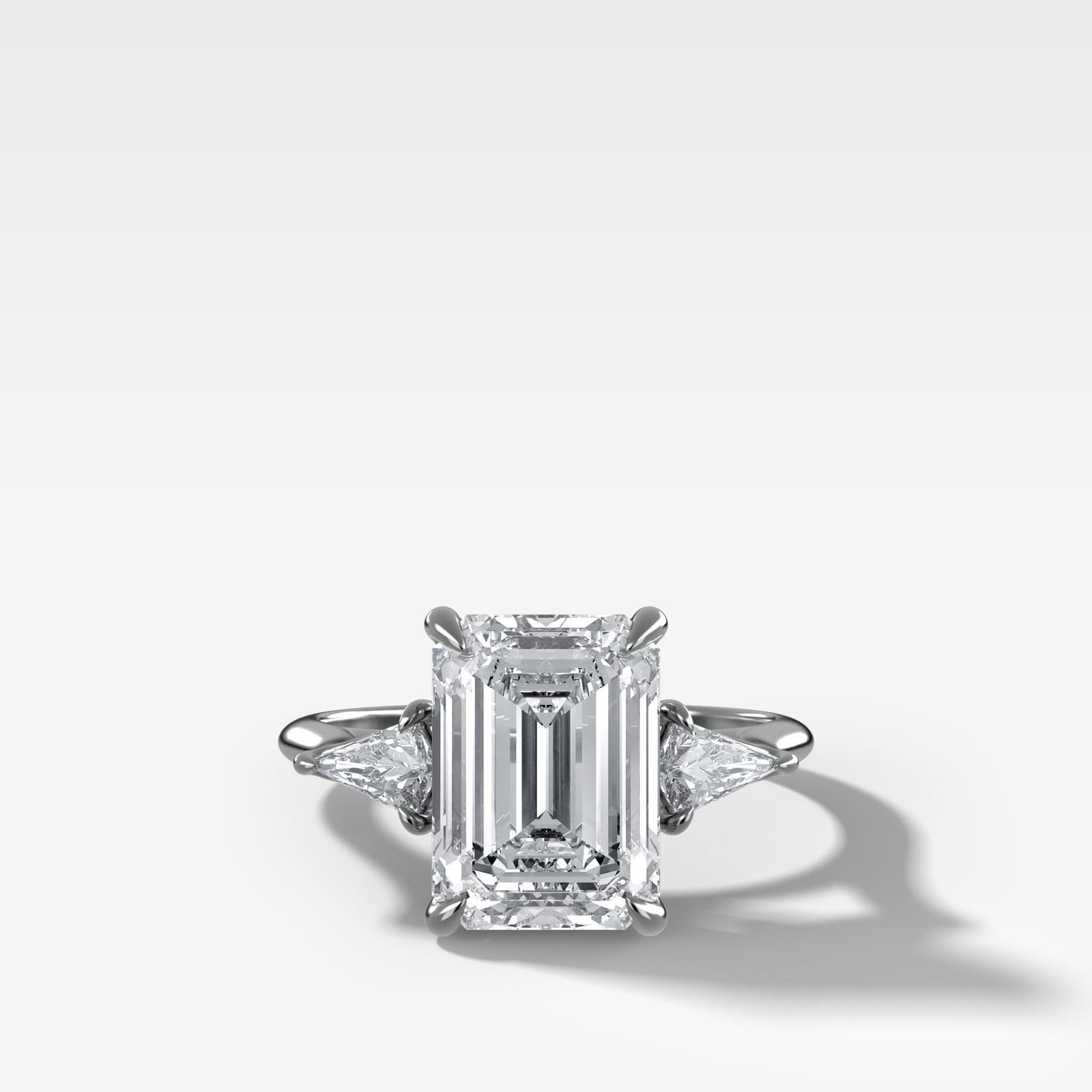 Three Stone Engagement Ring With Kite Side Stones and Emerald Cut Diamond - GOODSTONE