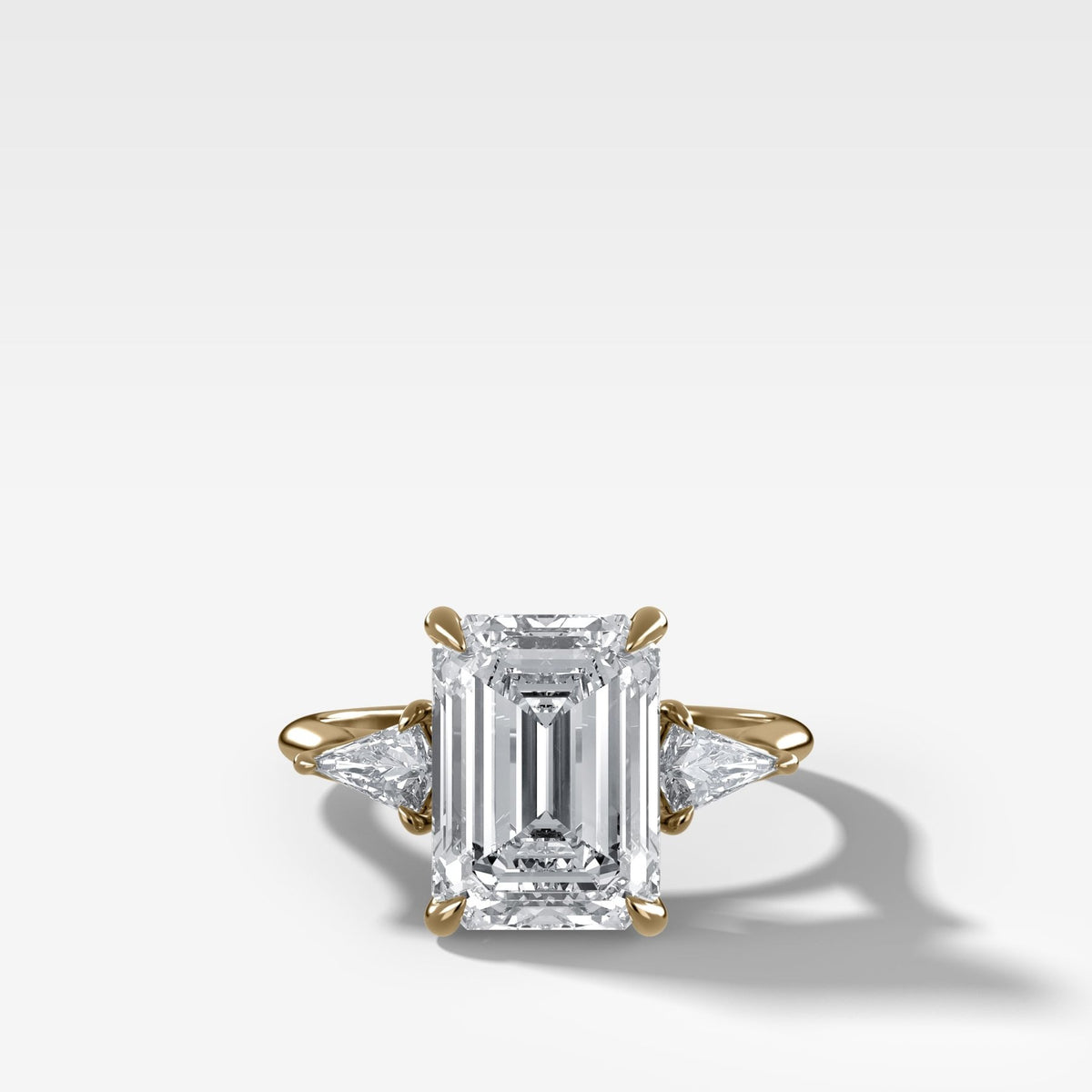 Three Stone Engagement Ring With Kite Side Stones and Emerald Cut Diamond - GOODSTONE