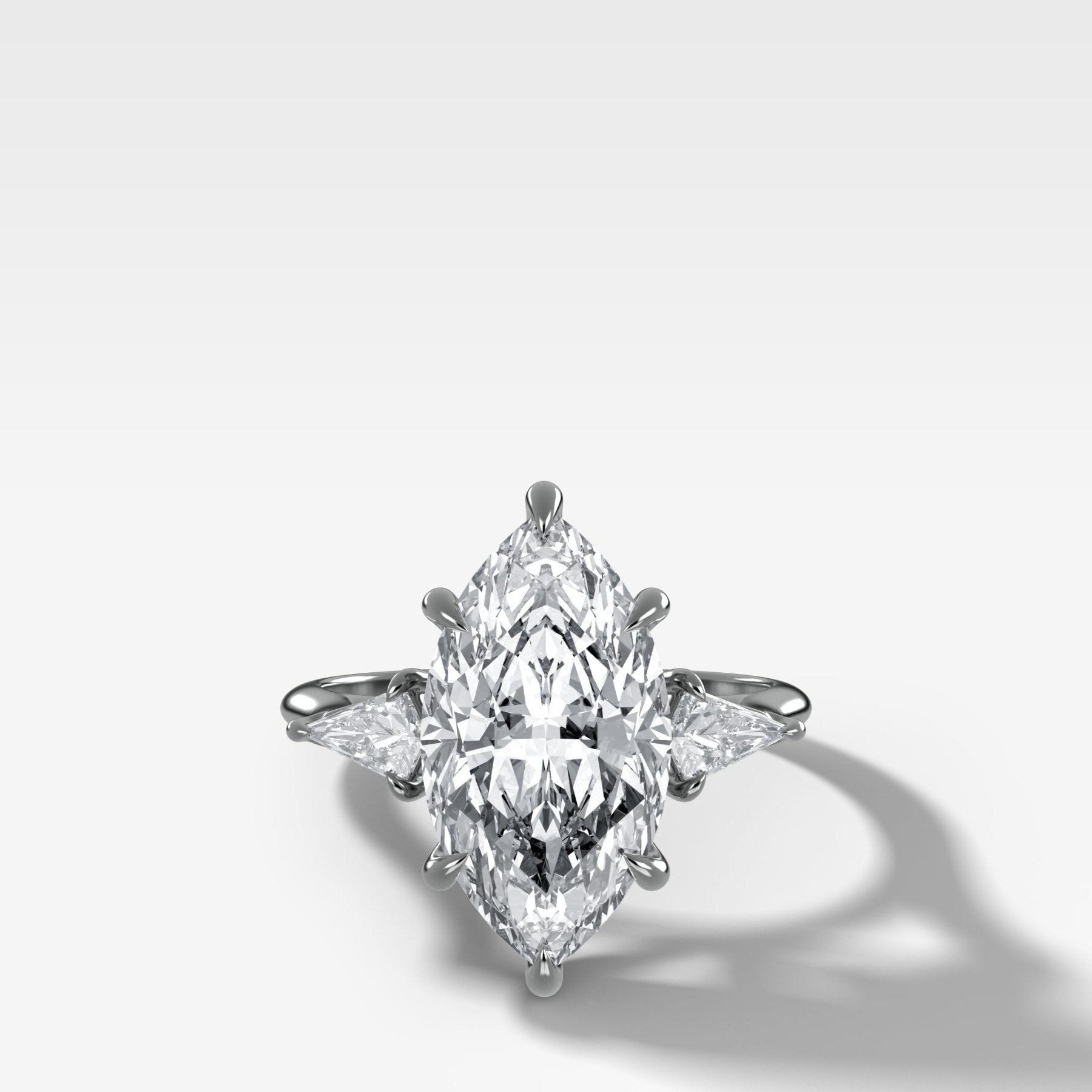 Three Stone Engagement Ring With Kite Side Stones and Marquise Cut Diamond - GOODSTONE