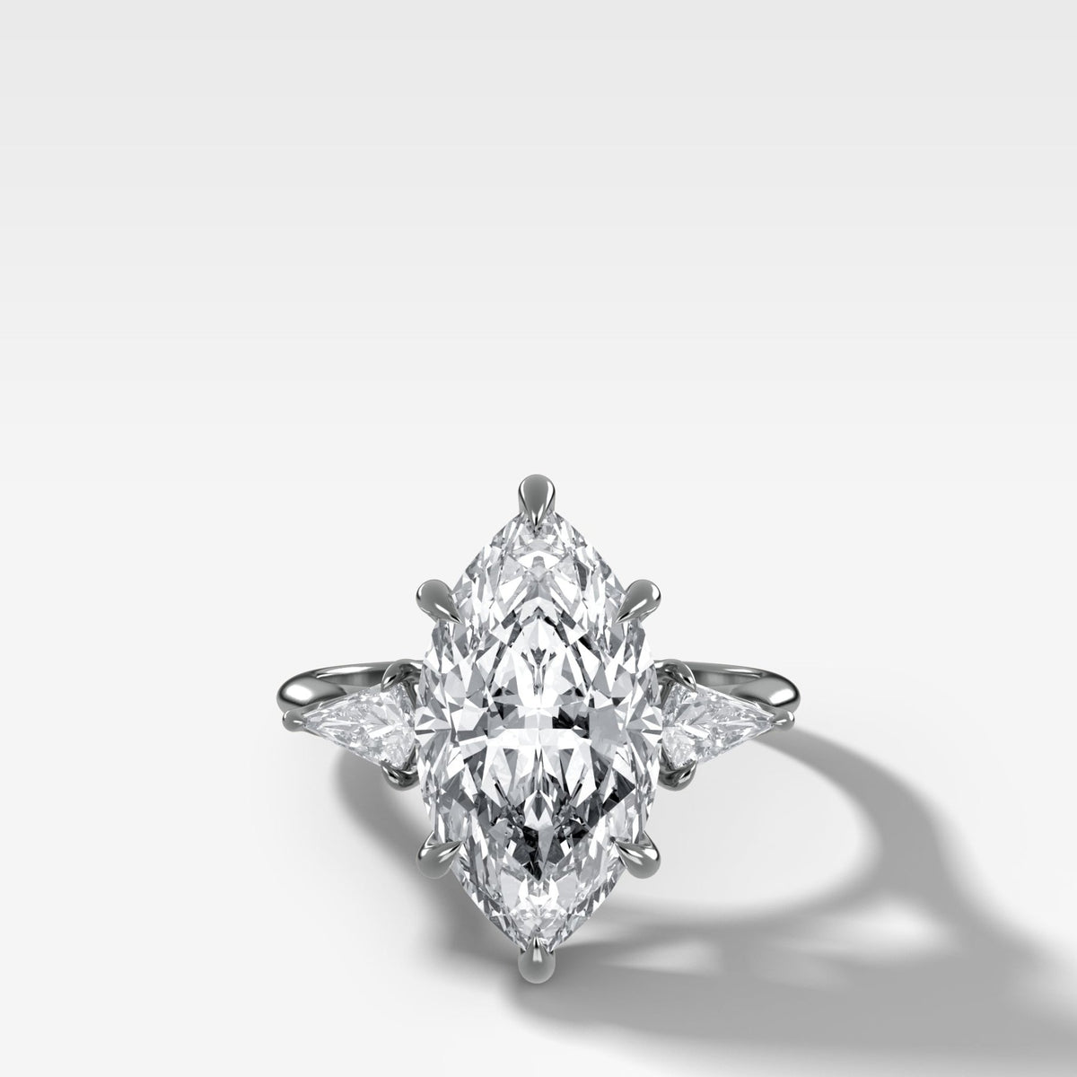 Three Stone Engagement Ring With Kite Side Stones and Marquise Cut Diamond - GOODSTONE